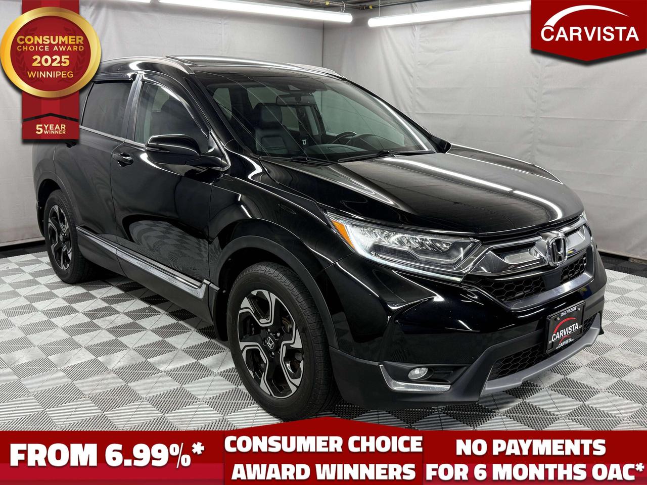 5 years running, consecutive receivers of the prestigious Consumer Choice Award in 2021, 2022, 2023, 2024 and 2025! Low rate dealer arranged financing available! 

LEATHER HEATED SEATS/STEERING WHEEL, SUNROOF, LANE ASSIST, BLIND SPOT MONITORING, ADAPTIVE CRUISE CONTROL, NAVIGATION, REVERSE CAMERA, DUAL CLIMATE CONTROLS, REMOTE START, POWER LIFTGATE, HEATED REAR SEATS, NO ACCIDENTS

This accident free 2019 Honda CR-V Touring AWD delivers premium comfort, impressive fuel economy, and the dependable year round capability that has made the CR-V one of Canada&rsquo;s most popular SUVs.

Powered by a responsive 1.5L turbocharged engine paired with a smooth continuously variable transmission, this CR-V provides confident performance for both city driving and highway travel. Honda&rsquo;s intelligent all wheel drive system adds extra traction and stability through changing Manitoba road and weather conditions.

Inside, the top of the line Touring cabin is finished with leather seating, heated front and rear seats, a heated steering wheel, driver&rsquo;s seat memory, dual zone automatic climate control, and a power sunroof. The spacious rear seating area and versatile split folding cargo space make it easy to accommodate passengers, groceries, luggage, or recreational gear.

Technology features include touchscreen navigation, Apple CarPlay, Android Auto, Bluetooth connectivity, a premium audio system, remote start, push button ignition, and a multi angle rearview camera. A hands free power liftgate provides convenient access to the cargo area when your hands are full.

Honda Sensing driver assistance technology adds confidence with adaptive cruise control, lane keeping assistance, forward collision warning, collision mitigation braking, and road departure mitigation. Blind spot monitoring, rear cross traffic alert, and parking sensors provide additional awareness in busy parking lots and on the highway.

Complete with LED lighting, stylish alloy wheels, roof rails, and refined chrome accents, this 2019 Honda CR-V Touring AWD offers the comfort of a luxury SUV with the practicality and reputation of a Honda. Visit Carvista today and take it for a test drive.

At Carvista we offer a unique buying experience, with no deceiving finance gimmicks and trades are welcome but not required! Carvista is a family operated business that has been in business for over 25 years, and has earned a A+ BBB Accreditation and outstanding consumer accolades. Offering 175 quality pre-owned vehicles, all are certified and Carfax verified, most with remaining factory warranty and a modern facility located on Winnipegs Regent Ave strip. We welcome you to visit us at 1201 Regent Ave W, at Carvista, and drive away in a like new vehicle for less. In many cases we can offer no payments for 6 months! Dont let your trade or credit stop you, we accept any kind, any time. CARVISTA.CA, "Where the deals are".
 Prices and payments exclude GST OR PST Carvista Inc. 
Dealer Permit # 1211, Category: Used Vehicle 
Please verify all ad details with a Carvista sales person, vehicle may not be exactly as shown.