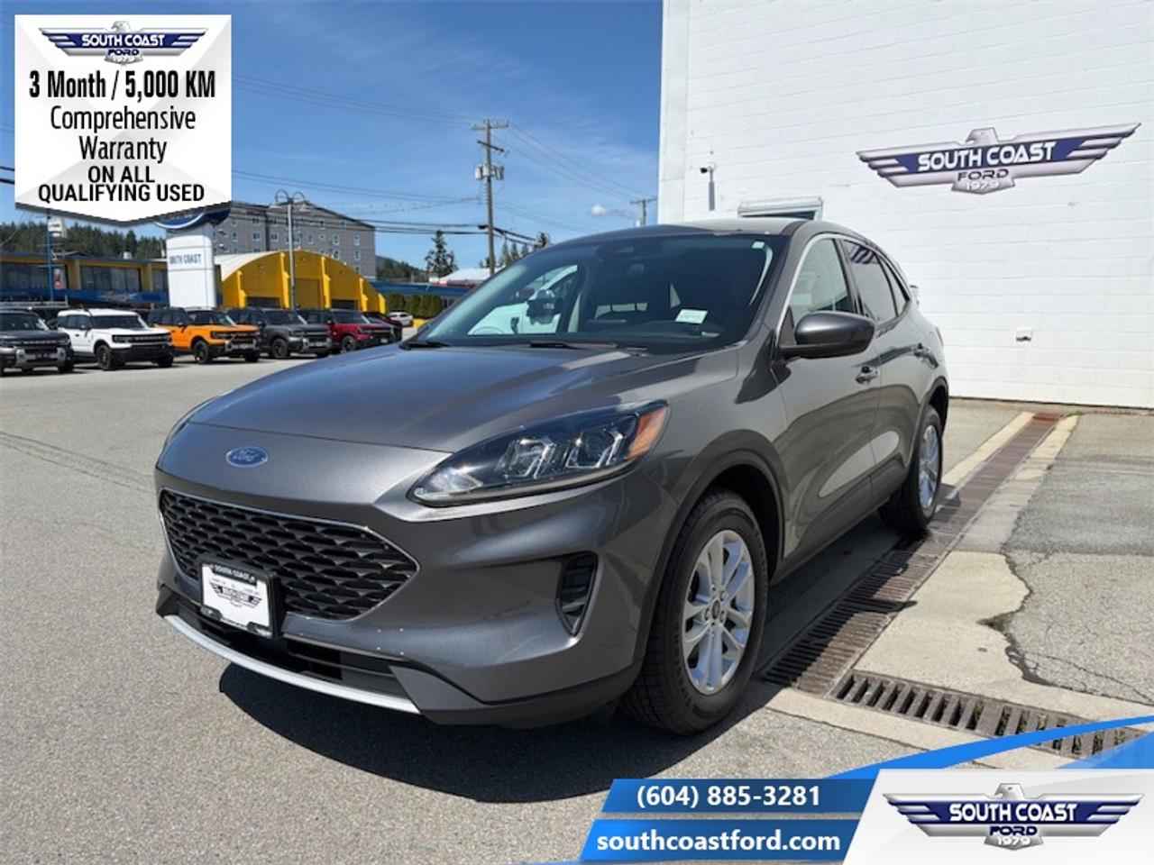 <b>Low Mileage, Navigation, Ford Co-Pilot360 Assist+, Reverse Sensing System, Adaptive Cruise Control, Cold Weather Package!</b><br> <br> <p style=color:Blue;><b>Upgrade your ride at South Coast Ford with peace of mind! Our used vehicles come with a minimum of 5,000 km and 3 months of Comprehensive Vehicle Warranty. Drive with confidence knowing your investment is protected.</b></p><br> <br> Compare at $23680 - Our Price is just $22990! <br> <br>In the city or in the forest, the Ford Escape is built to get you through any terrain with confidence and comfort. This 2021 Ford Escape is for sale today in Sechelt.<br> <br>The Ford Escape was built for an active lifestyle and offers plenty of options for you to hit the road in your own individual style. Whether you need a family SUV for soccer practice, a capable adventure vehicle, or both, the versatile Ford Escape has you covered. Built for those who live on the go, the Ford Escape was made to be unstoppable.<br> <br>This low mileage SUV has just 46,291 km. Its Carbonized Grey Metallic in colour. It has a 8 Speed Automatic transmission and is powered by a 181HP 1.5L 3 Cylinder Engine. It may have some remaining factory warranty, please check with dealer for details. <br> <br> Our Escapes trim level is SE AWD. Upgrading to this Ford Escape SE is a great choice as it comes loaded with heated front seats, stylish aluminum wheels and Fords SYNC 3 infotainment system complete with a large touchscreen, Apple CarPlay and Android Auto. Additional features include SiriusXM radio, FordPass Connect 4G LTE, a smart device remote starter and unique exterior accents. For added convenience and safety this Escape also comes with a 60-40 split-folding rear seat, remote keyless entry with a proximity key plus Ford Co-Pilot360 that features lane keep assist, a rear view camera, blind spot detection, automatic emergency braking and cross traffic alert. This vehicle has been upgraded with the following features: Navigation, Ford Co-Pilot360 Assist+, Reverse Sensing System, Adaptive Cruise Control, Cold Weather Package, Heated Steering Wheel, Remote Engine Start.<br> To view the original window sticker for this vehicle view this <a href=http://www.windowsticker.forddirect.com/windowsticker.pdf?vin=1FMCU9G69MUA87763 target=_blank>http://www.windowsticker.forddirect.com/windowsticker.pdf?vin=1FMCU9G69MUA87763</a>. <br/><br> <br>To apply right now for financing use this link: <a href=https://www.southcoastford.com/financing/ target=_blank>https://www.southcoastford.com/financing/</a><br> <br/>Buy this vehicle now for the lowest bi-weekly payment of <b>$190.51</b> with $0 down for 84 months @ 7.99% APR O.A.C. (All rates are OAC. Check with our team for rate specials on new and used vehicles. Banks will have financed minimum amounts for certain rates. / Total Obligation of $31831 ). See dealer for details. <br><br>Call South Coast Ford Sales or come visit us in person. Were convenient to Sechelt, BC and located at 5606 Wharf Avenue. and look forward to helping you with your automotive needs.<br><br> Come by and check out our fleet of 20+ used cars and trucks and 100+ new cars and trucks for sale in Sechelt.  o~o
