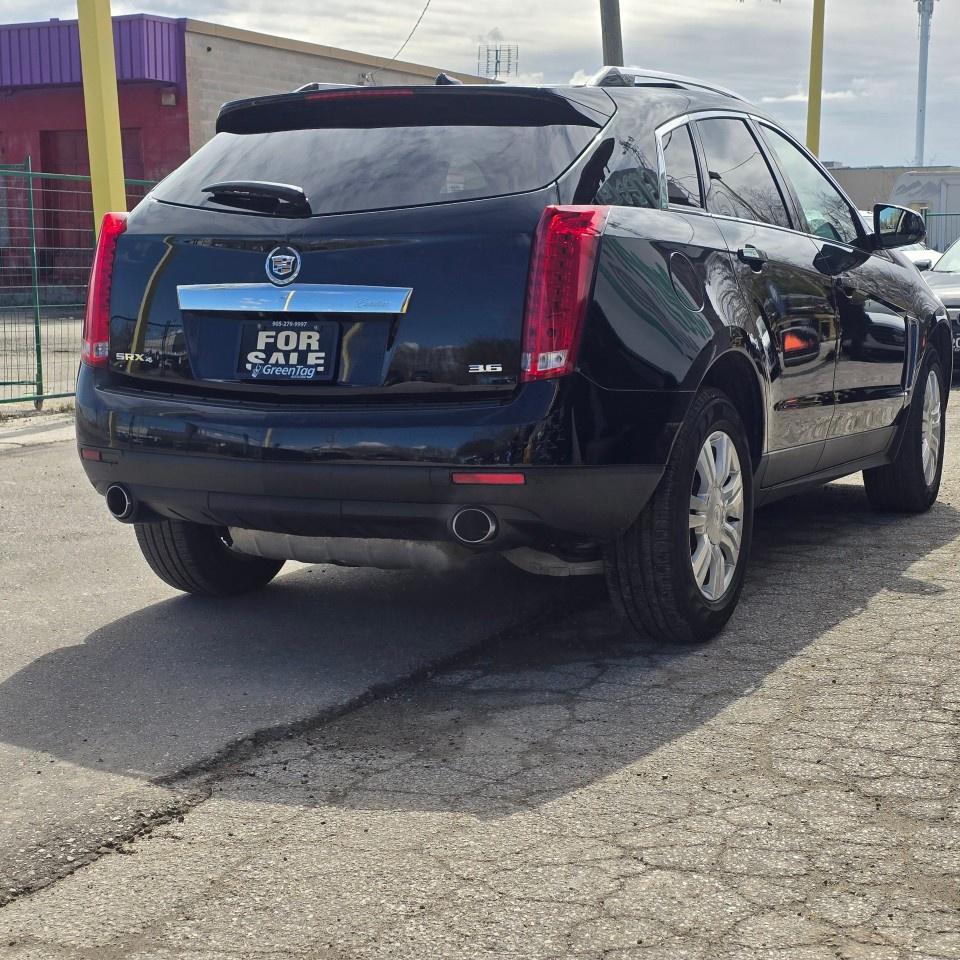2014 Cadillac SRX AWD 4DR LUXURY Photo