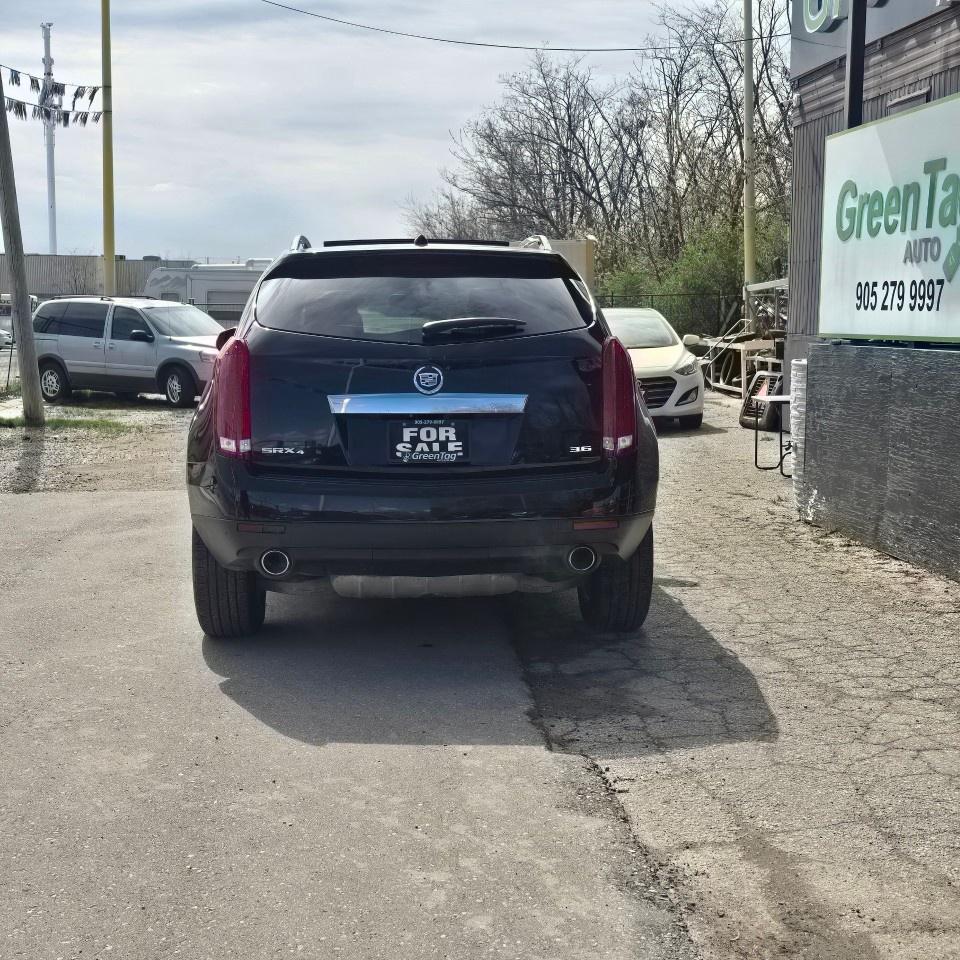 2014 Cadillac SRX AWD 4DR LUXURY Photo