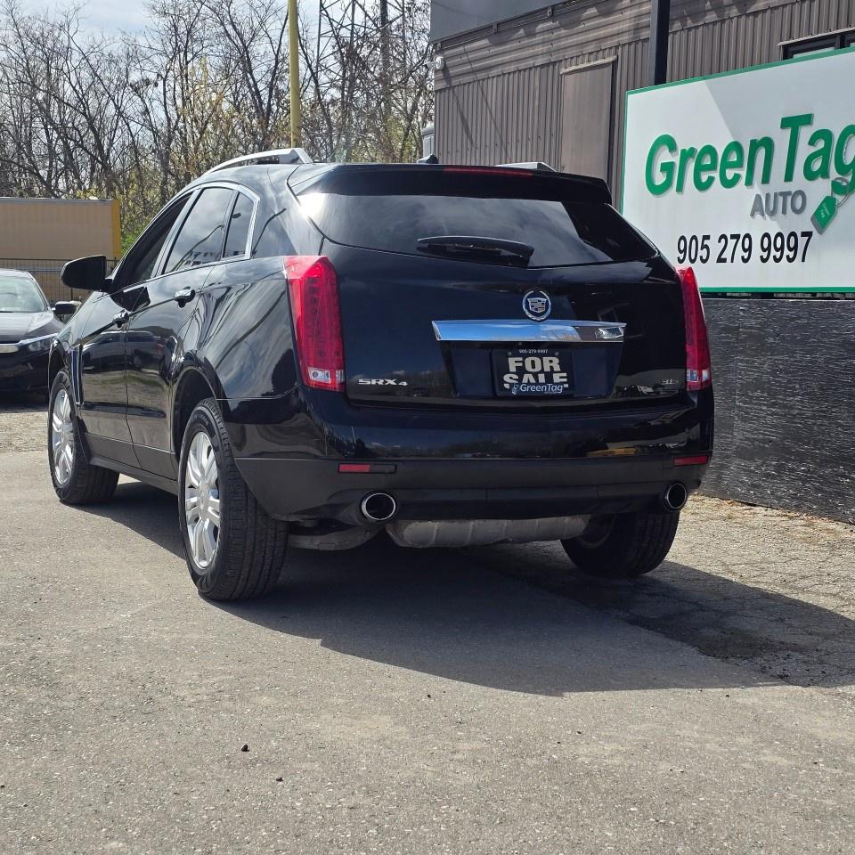 2014 Cadillac SRX AWD 4DR LUXURY Photo