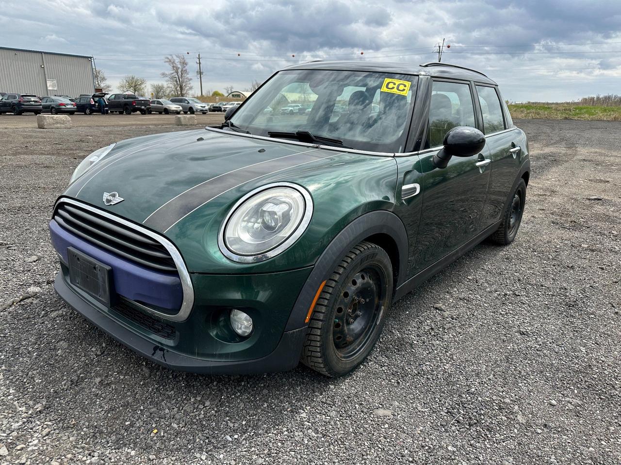 Sold As-Is. CarFax Provided. Sporty and practical four-door Mini! Well-equipped with leather seats, backup camera, and more. Powerful and efficient turbocharged three cylinder engine. Book your appointment to come see this charming little British car.
