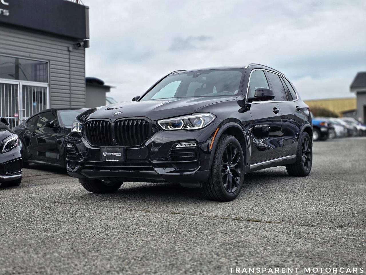 Transparent Motorcars is pleased to offer this beautiful 2019 BMW X5 xDrive 40i With 63,285kms. It Features 335 Horsepower 3.0L Turbo Engine Paired With 8-Speed Shiftable Automatic Transmission Layered With All-Wheel-Drive System, PREMIUM ENHANCE PACKAGE, Hands-Free Liftgate, HD Radio, Head-Up Display, Heated Seats Front And Rear, Keyless Entry/Start, Multi-Zone AC, Power Door Locks, Harman/Kardon Premium Sound System, Remote Engine Start, Remote Trunk Release, Universal Garage Door Opener, WIFI Hotspot, LED Headlights, Privacy Glass, Blind Spot Monitoring, Lane Departure Warning, Navigation, Wireless Apple CarPlay, Panoramic Sunroof And Much More! <br/> <br/> <br/> Stock# G000260B Dealer # 50276 <br/> <br/> <br/> $995 Documentation Fee <br/> <br/> <br/> 3 Month Warranty Will Be Provided <br/> <br/> <br/> This vehicle has undergone a comprehensive 110-point inspection at our state-of-the-art service facility, covering: Powertrain, Suspension, Tire Tread Depth ,Brake Condition ,All Electrical Components <br/> <br/> <br/> *Each vehicle comes with a limited warranty for your peace of mind. <br/> <br/> <br/> *Free, full CARFAX Vehicle History Report available upon request. <br/> <br/> <br/> *We are a 5-star rated Google dealership, trusted by our customers. <br/> <br/> <br/> *Thousands of satisfied customers  we invite you to join our automotive family! <br/> <br/> <br/> *Complimentary pick-up service from the airport, ferry terminal, or SkyTrain station is available. <br/> <br/> <br/> *For details on our refund and buyback policy, please contact our team directly. <br/> <br/> <br/> At our dealership, we pride ourselves on building lasting relationships with our customers. Were not just a one-time dealer  we are committed to being your trusted partner for all your vehicle needs, now and in the future. From your initial purchase to ongoing service, we aim to exceed expectations every step of the way. <br/>