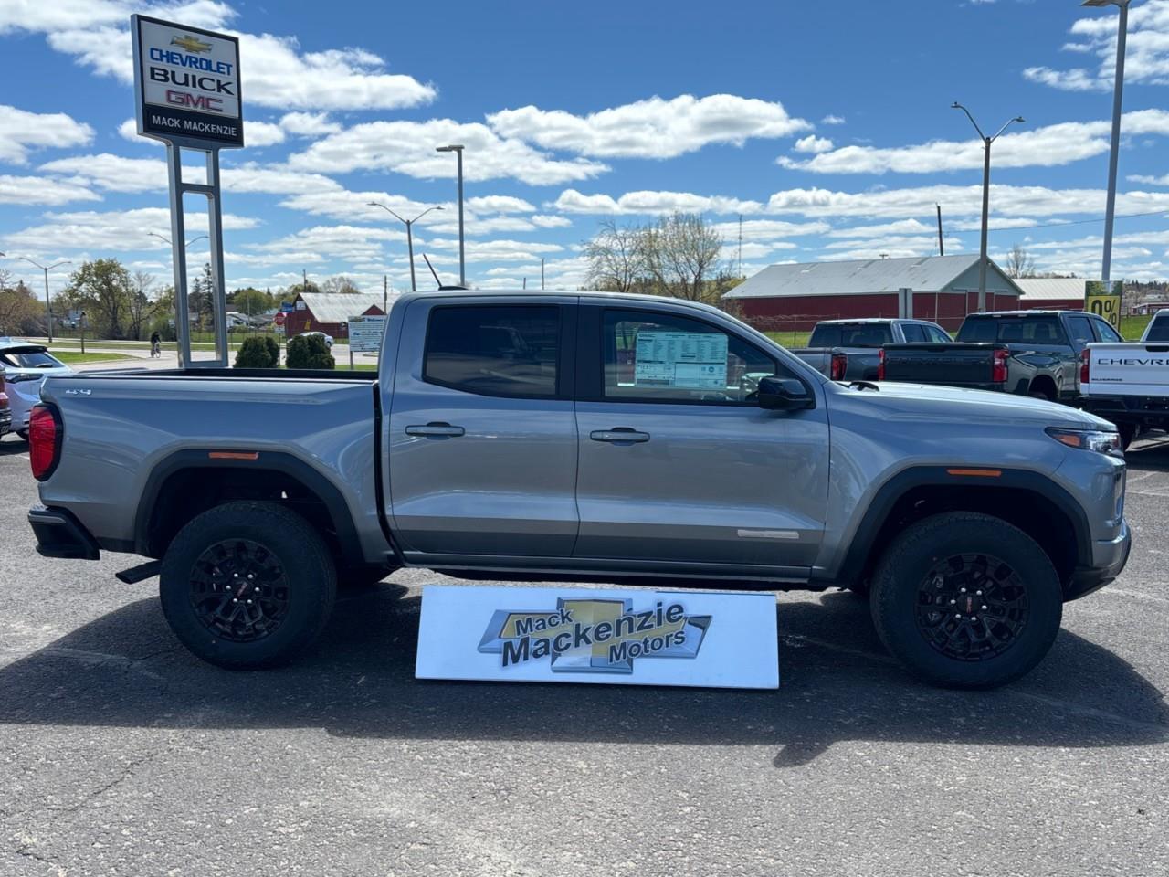 2026 GMC Canyon Elevation New Mid Size 5 Passenger Crew Cab 4X4 Truck with 2 Factory Installed Lift, Trailer Package, Heated Front Seats, Adaptive Cruise Control, HD Surround Vision and a 11 Touchscreen Radio with Google Built Photo