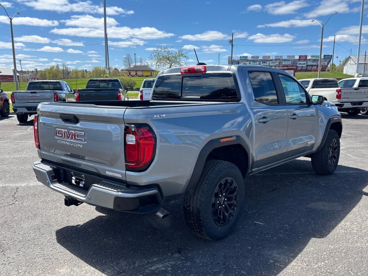 2026 GMC Canyon Elevation New Mid Size 5 Passenger Crew Cab 4X4 Truck with 2 Factory Installed Lift, Trailer Package, Heated Front Seats, Adaptive Cruise Control, HD Surround Vision and a 11 Touchscreen Radio with Google Built Photo