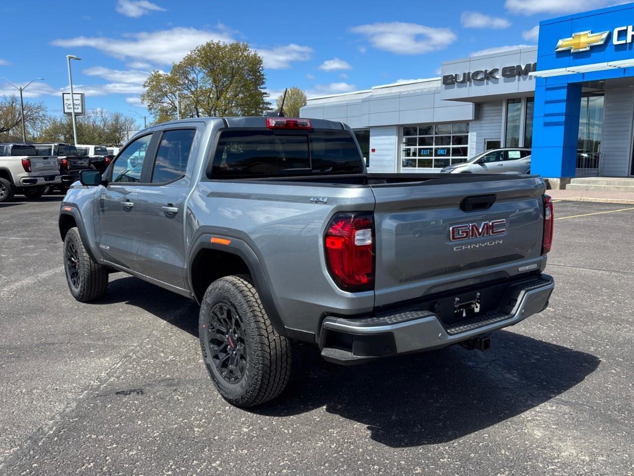 2026 GMC Canyon Elevation New Mid Size 5 Passenger Crew Cab 4X4 Truck with 2 Factory Installed Lift, Trailer Package, Heated Front Seats, Adaptive Cruise Control, HD Surround Vision and a 11 Touchscreen Radio with Google Built Photo