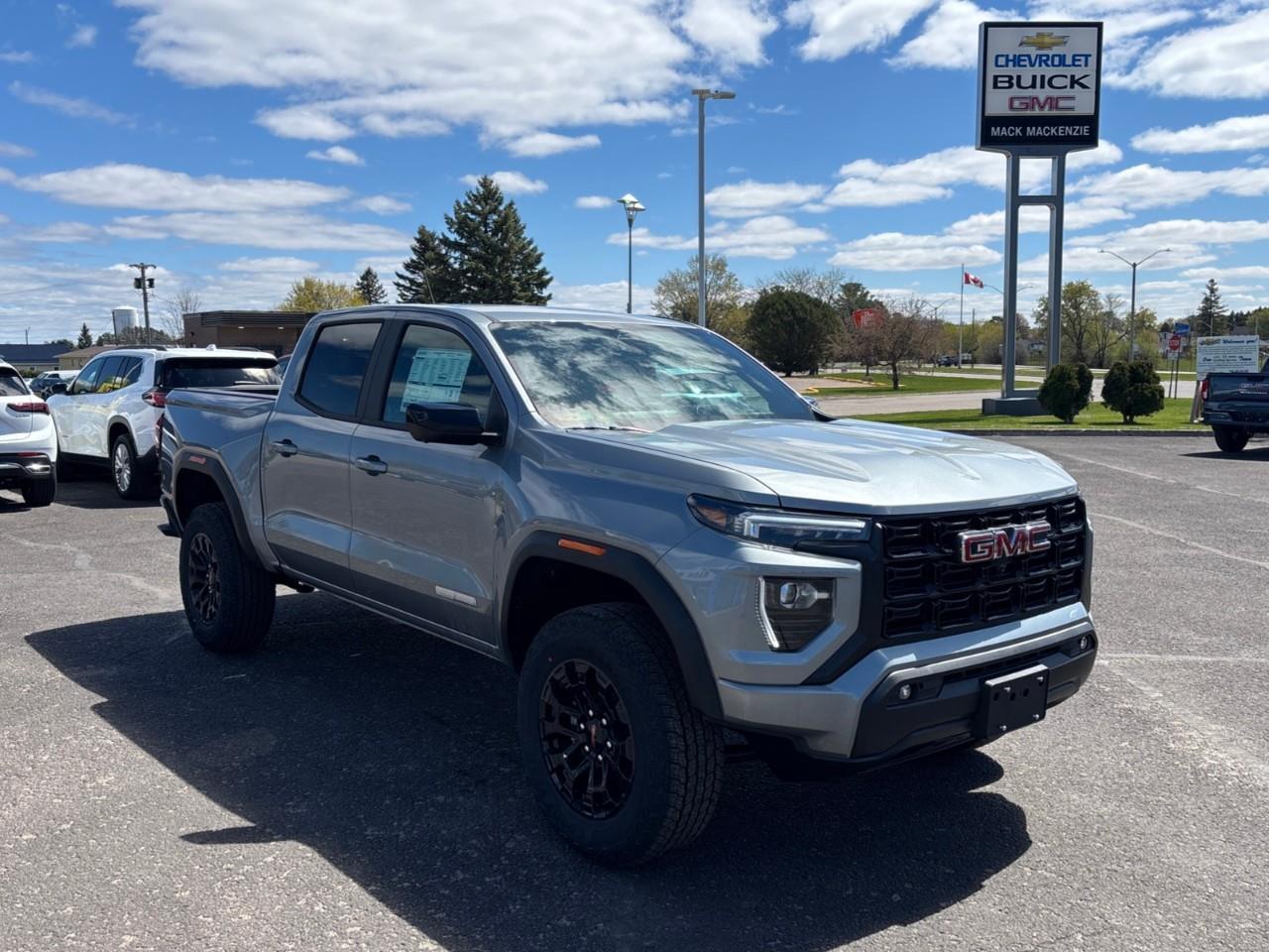 2026 GMC Canyon Elevation New Mid Size 5 Passenger Crew Cab 4X4 Truck with 2 Factory Installed Lift, Trailer Package, Heated Front Seats, Adaptive Cruise Control, HD Surround Vision and a 11 Touchscreen Radio with Google Built Photo
