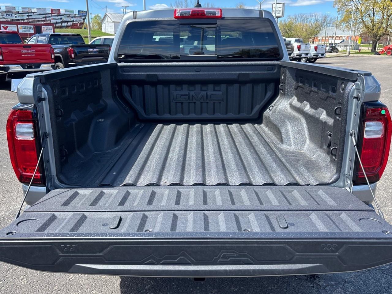 2026 GMC Canyon Elevation New Mid Size 5 Passenger Crew Cab 4X4 Truck with 2 Factory Installed Lift, Trailer Package, Heated Front Seats, Adaptive Cruise Control, HD Surround Vision and a 11 Touchscreen Radio with Google Built Photo