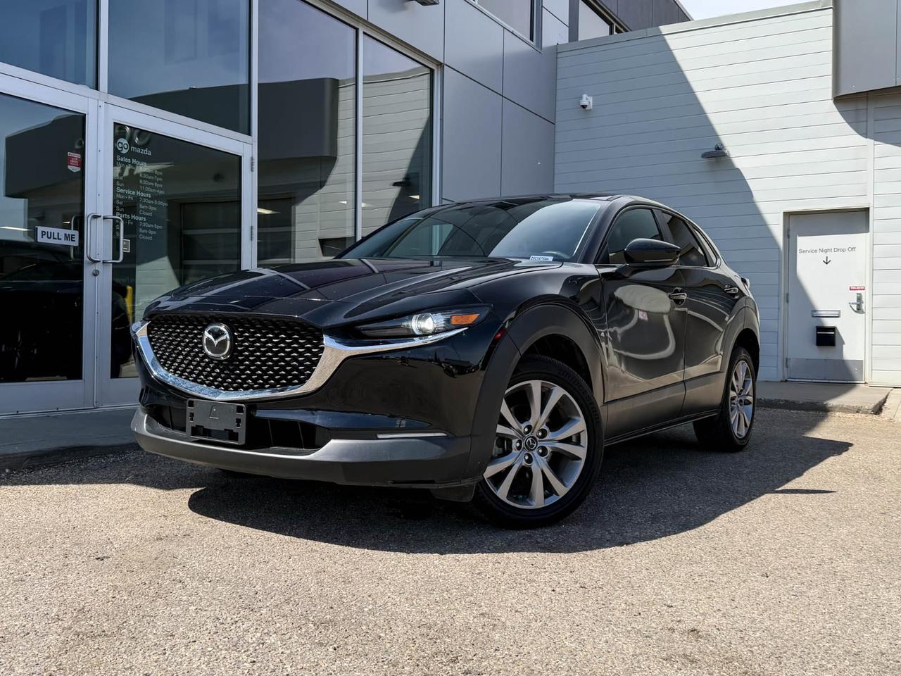 Discover the perfect blend of style, performance, and advanced features with this pre-owned 2023 Mazda CX-30 GS AWD in sleek Black. Powered by a fuel-efficient 2.5L SKYACTIV-G engine paired with a smooth 6-speed automatic transmission and all-wheel drive, it offers confident handling year-round.Enjoy heated front seats, dual-zone automatic climate control, and a premium 8.8-inch display with navigation-ready AM/FM/HD radio for comfort and connectivity. Safety is top-notch with 10 airbags, blind spot monitoring, lane departure prevention, and rearview camera.With stylish 18 alloy wheels, LED headlights, and a refined interior featuring leatherette accents and a leather-wrapped heated steering wheel, this CX-30 delivers both luxury and capability. Dont miss outexperience Mazdas renowned driving dynamics today. Contact us now for a test drive!This vehicle has been registered in the following locations in the province ofBritish Columbia and is showing a CarFax incident with no reported amount.