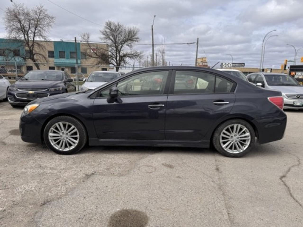 <p>Auto Save (Dealer # 1747)</p>
<p>2014 SUBARU IMPREZA, AWD, 105,915 KM</p>
<p>2.0 L&nbsp; 4 CYLINDER ENGINE</p>
<p>**Clean Title**</p>
<p>**Manitoba Safety**</p>
<p>&nbsp;</p>
<p>FEATURES:</p>
<p>&nbsp;</p>
<p>4 CYLINDER</p>
<p>5 PASSENGER</p>
<p>AIR CONDITIONING&nbsp;</p>
<p>AM/FM/RADIO</p>
<p>BACK UP CAMERA</p>
<p>BLUETOOTH</p>
<p>CRUISE CONTROL</p>
<p>HEATED SEATS - DRIVER AND PASSENGER</p>
<p>POWER LOCKS</p>
<p>POWER STEERING</p>
<p>POWER WINDOWS</p>
<p>SUNROOF</p>
<p>TRACTION CONTROL</p>
<p>&nbsp;</p>
<p>&nbsp;Asking $8999 + taxes</p>
<p>** Financing Available O.A.C**</p>
<p>** Warranty Available **</p>
<p>&nbsp;</p>
<p>Call (204)-774-8900 or (204)-999-9500</p>
<p>Located 6 mins away from Polo Park Mall</p>
<p>1450 Notre Dame Ave, Winnipeg, Manitoba</p>
<p>www.autosavewpg.com</p>
<p>&nbsp;</p>
<p>While all information is believed to be accurate on this page, please verify any information in question with an Auto Save sales representative. Auto Save is not liable for any errors or omissions.</p>