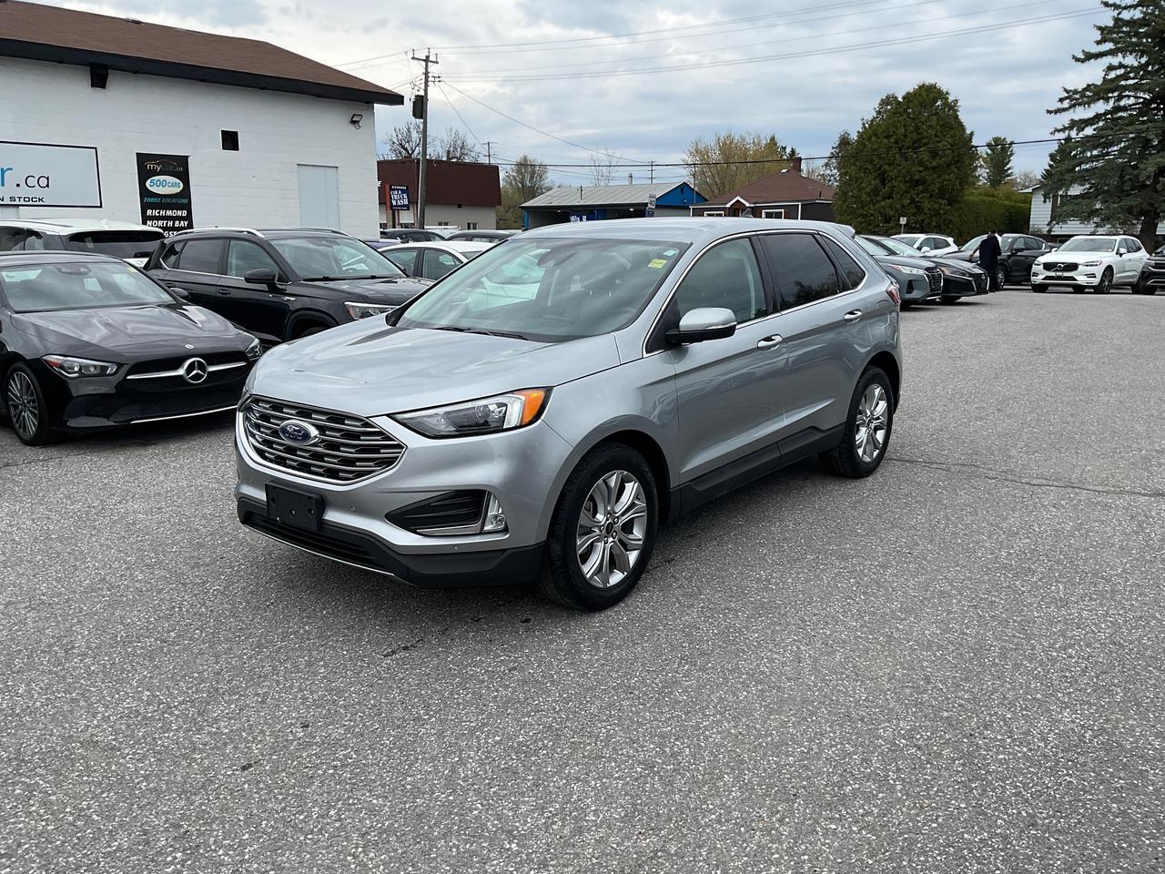 ???? 2.0L Titanium  FORD EDGE TITANIUM 2024  Premium comfort meets all-weather capability! ????<br><br>

This well-equipped 2024 Ford Edge Titanium with All Wheel Drive and only 84,192 KMs is ready to deliver style, safety, and convenience for every journey.<br><br>

? Heated Seats<br>
? Leather<br>
? Remote Start<br>
? Apple/Android CarPlay<br>
? Blind Spot Assist<br>
? Backup Camera<br>
? Bluetooth Connectivity<br>
? Air Conditioning<br>
? Cruise Control<br>
? Full Power Group<br><br>

?? NO FEES! <span>(Just pay applicable taxes.)</span><br>
?? LOWEST PRICE GUARANTEED!<br><br>

?? 3 LOCATIONS TO SERVE YOU BETTER:<br>
?? RICHMOND: 1-888-416-2199<br>
?? KINGSTON: 1-888-508-3494<br>
?? NORTH BAY: 1-888-282-3560<br><br>

?? Visit <strong>WWW.MYCAR.CA</strong> to see this FORD EDGE and more!<br>
?? Confidence, comfort, and value  all in one! ??