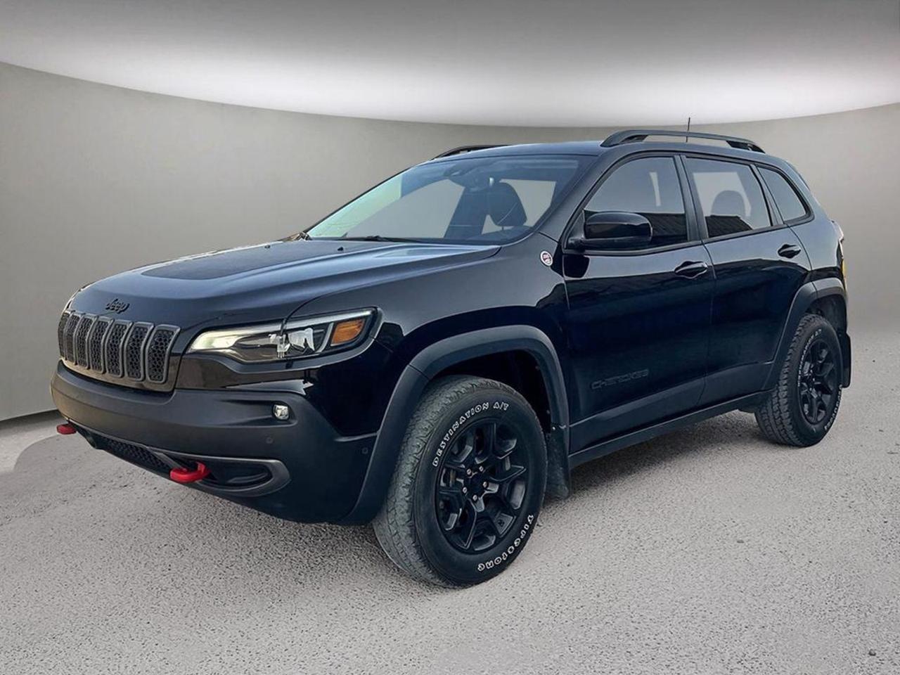 Discover rugged capability and refined comfort with this pre-owned 2023 Jeep Cherokee Trailhawk 4x4 in sleek Diamond Black Crystal. Powered by a turbocharged 2.0L engine paired with a smooth 9-speed automatic transmission, it offers impressive performance and off-road prowess with features like Off-Road Suspension, selectable drivetrain modes, and hill descent control. Enjoy premium leather-faced bucket seats with heated and ventilated front seating, a user-friendly Uconnect 4C Navigation system with an 8.4 touchscreen, and advanced safety with 10 airbags plus forward collision mitigation and blind spot warning. Black aluminum wheels, LED headlights, and black exterior accents complete the bold Trailhawk look. Ready for adventure and daily driving alikeschedule your test drive today at Aurora Dodge!