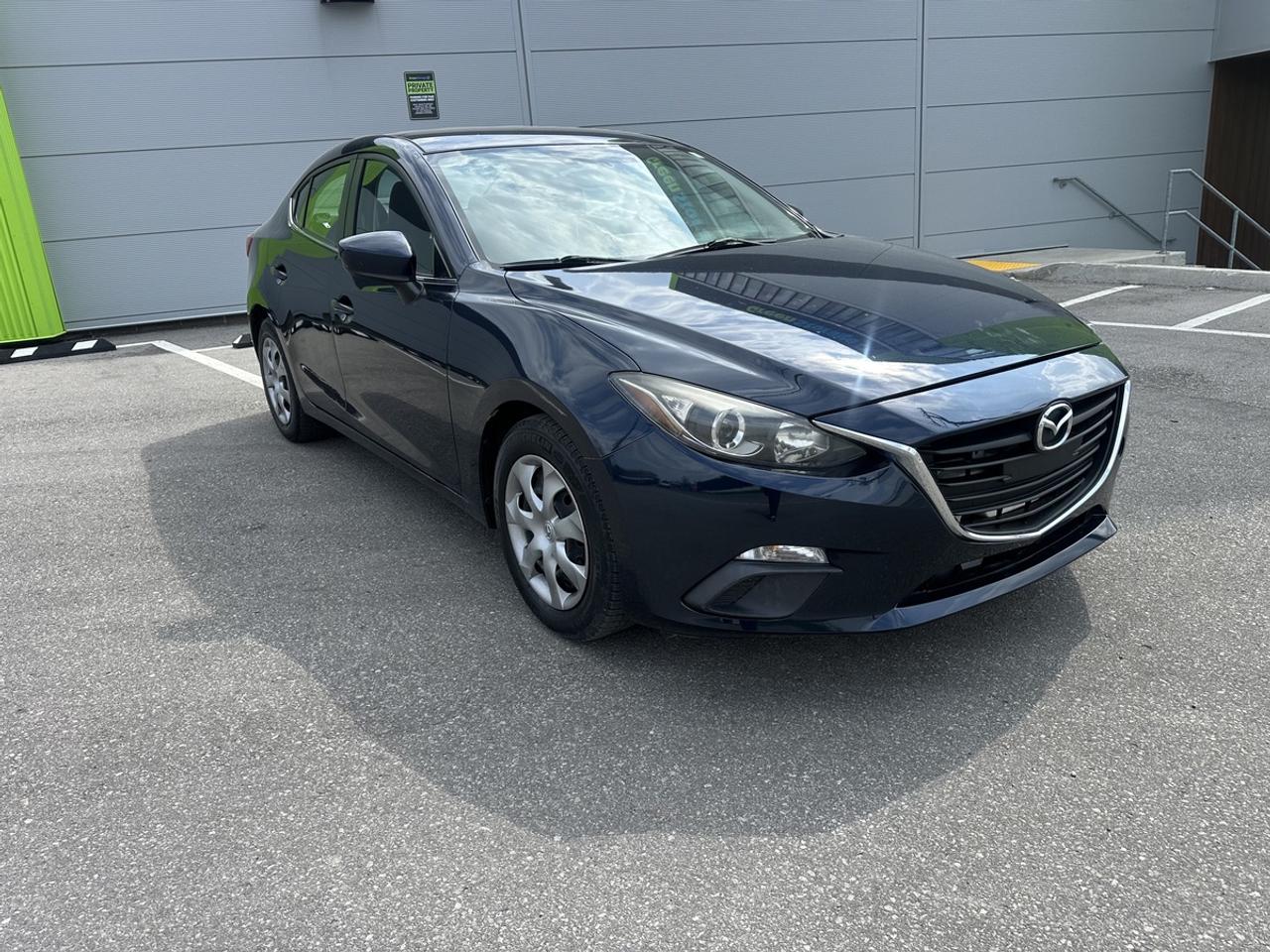2015 Mazda MAZDA3 i Touring Photo