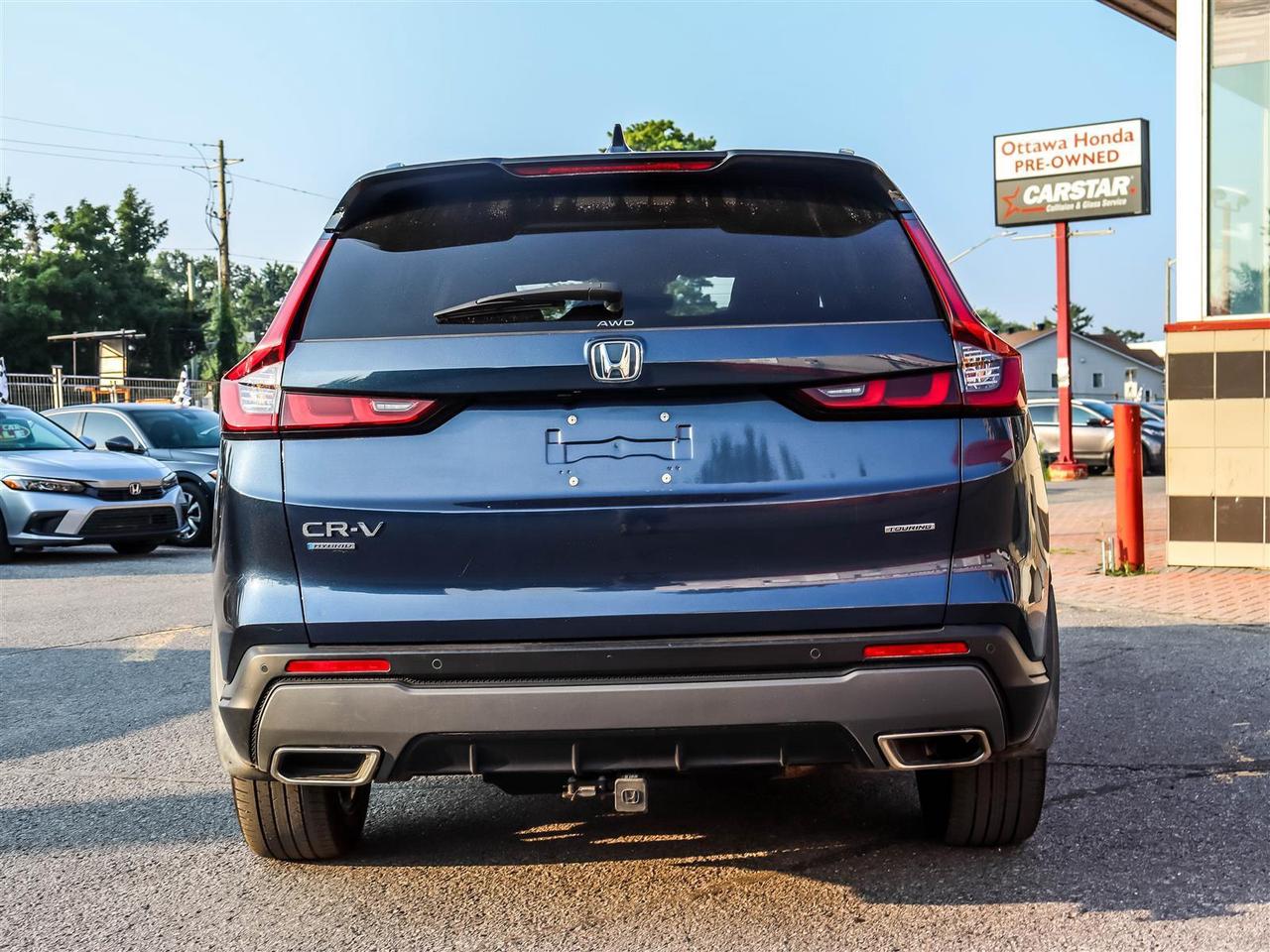 2023 Honda CR-V Hybrid Touring HYBRID SUNROOF LEATHER Photo