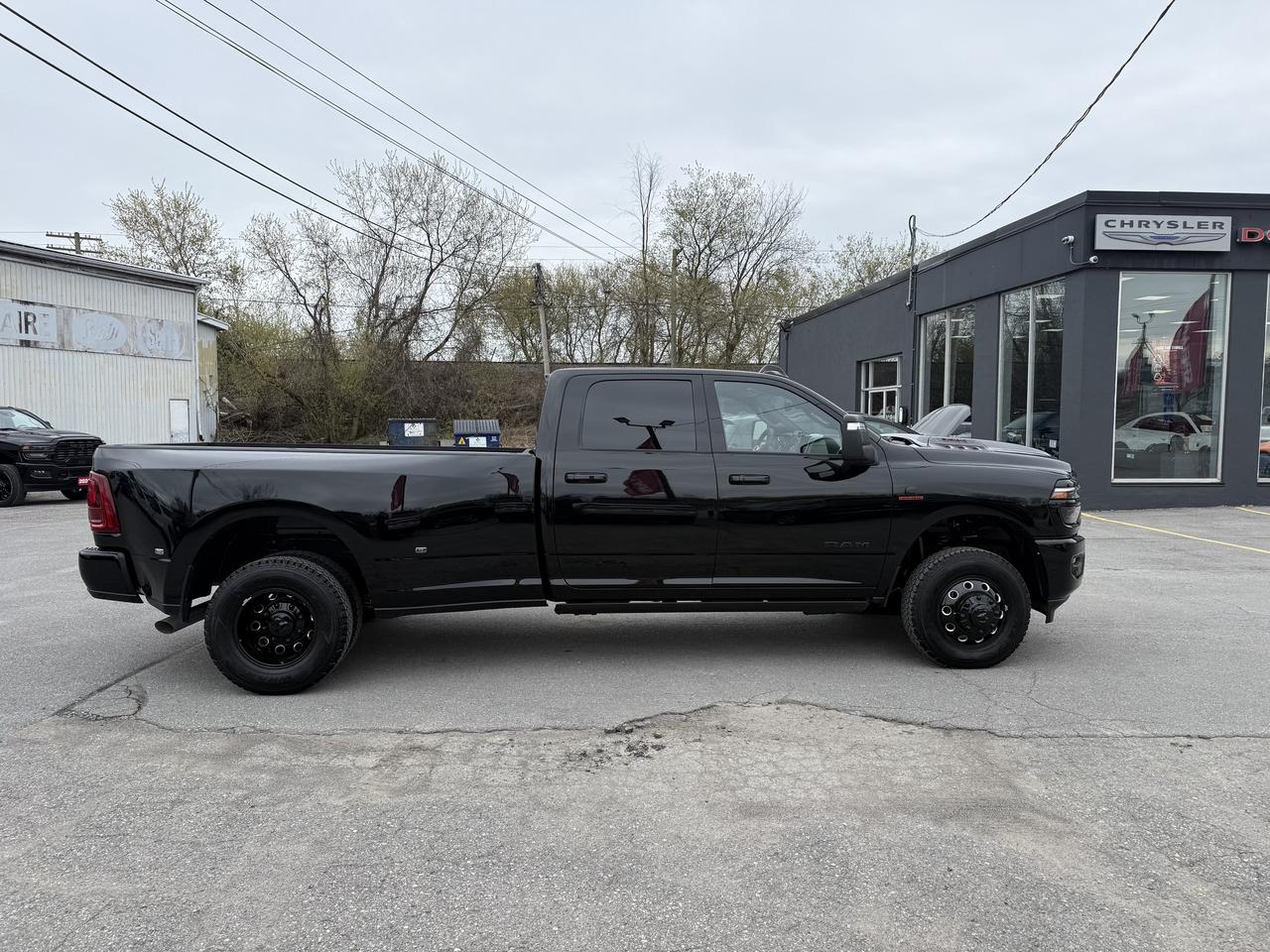 2026 RAM 3500 LARAMIE CREW 4X4 DUALLIE- SUNROOF - AIR SUSP Photo