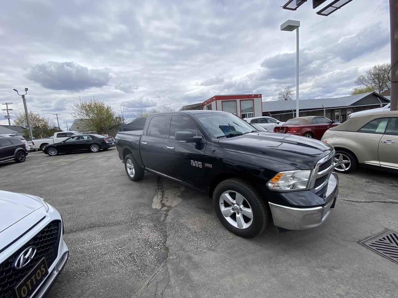 2016 RAM 1500 4WD Crew Cab 140.5  Big Horn Photo