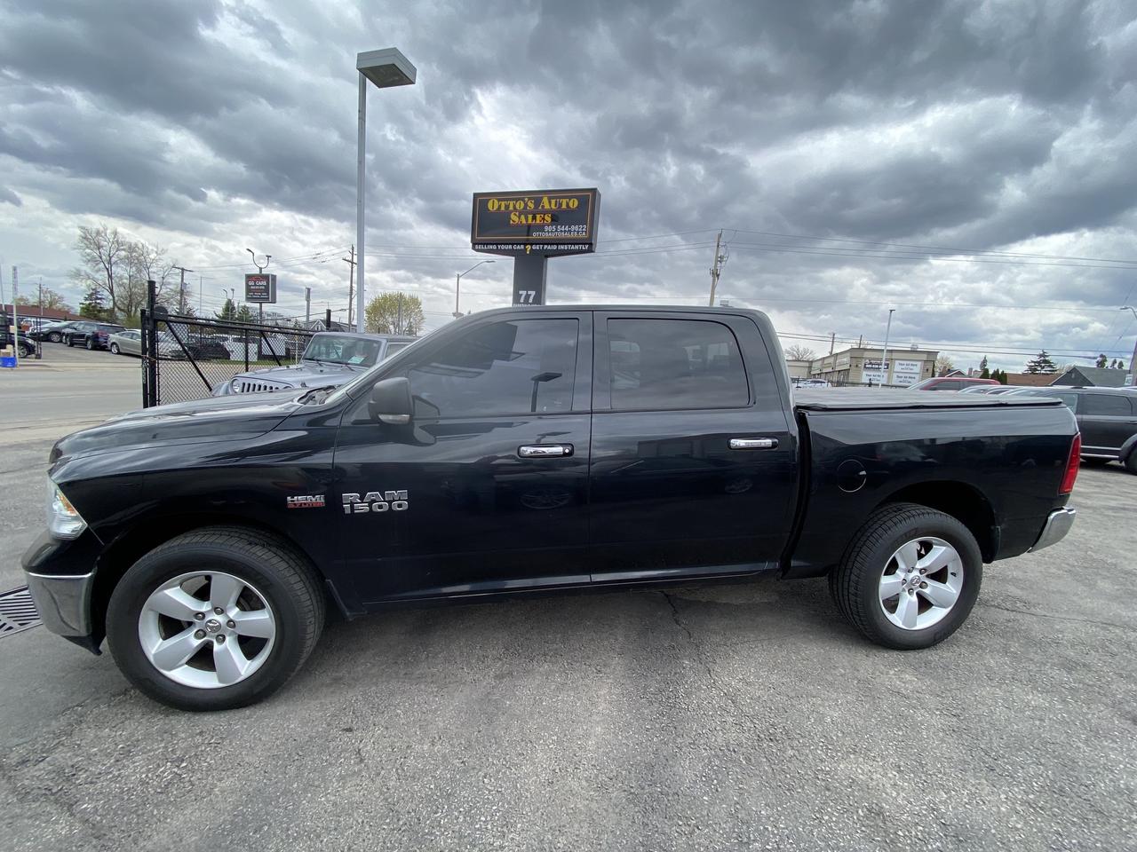 2016 RAM 1500 4WD Crew Cab 140.5  Big Horn Photo