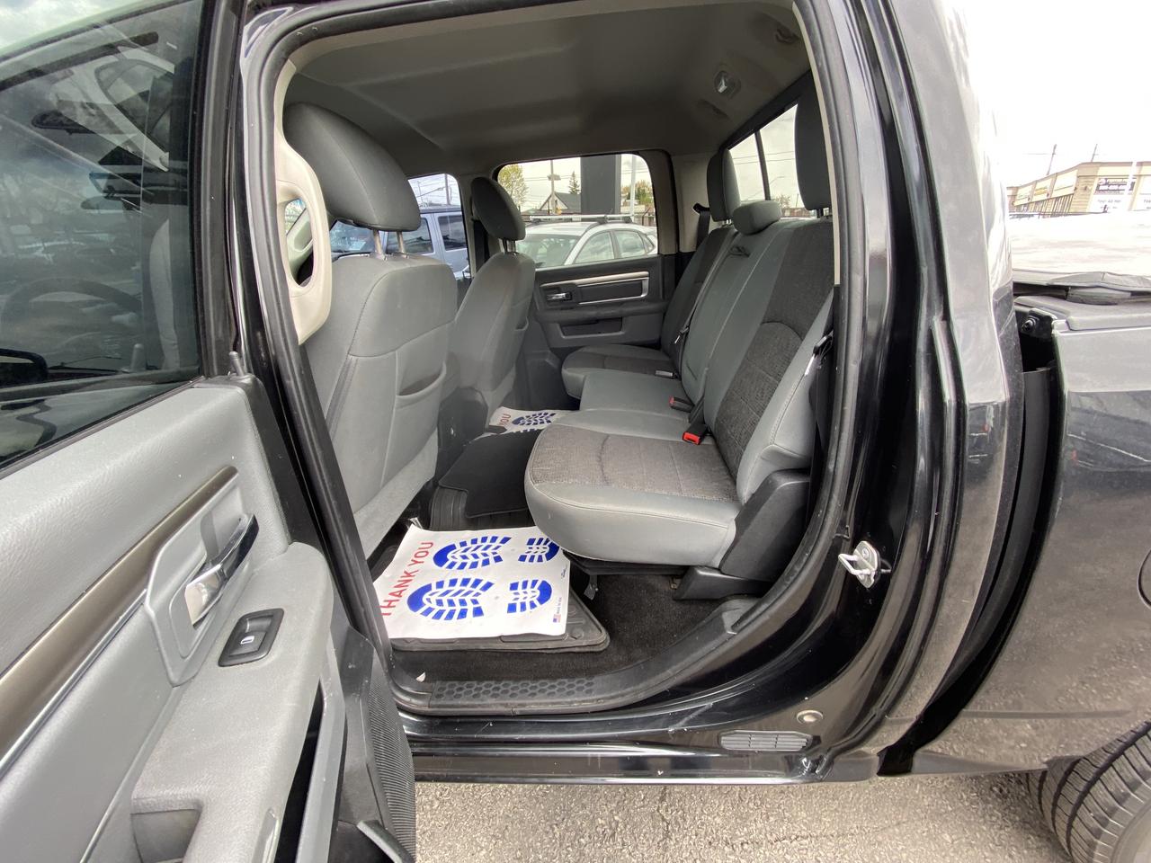 2016 RAM 1500 4WD Crew Cab 140.5  Big Horn Photo