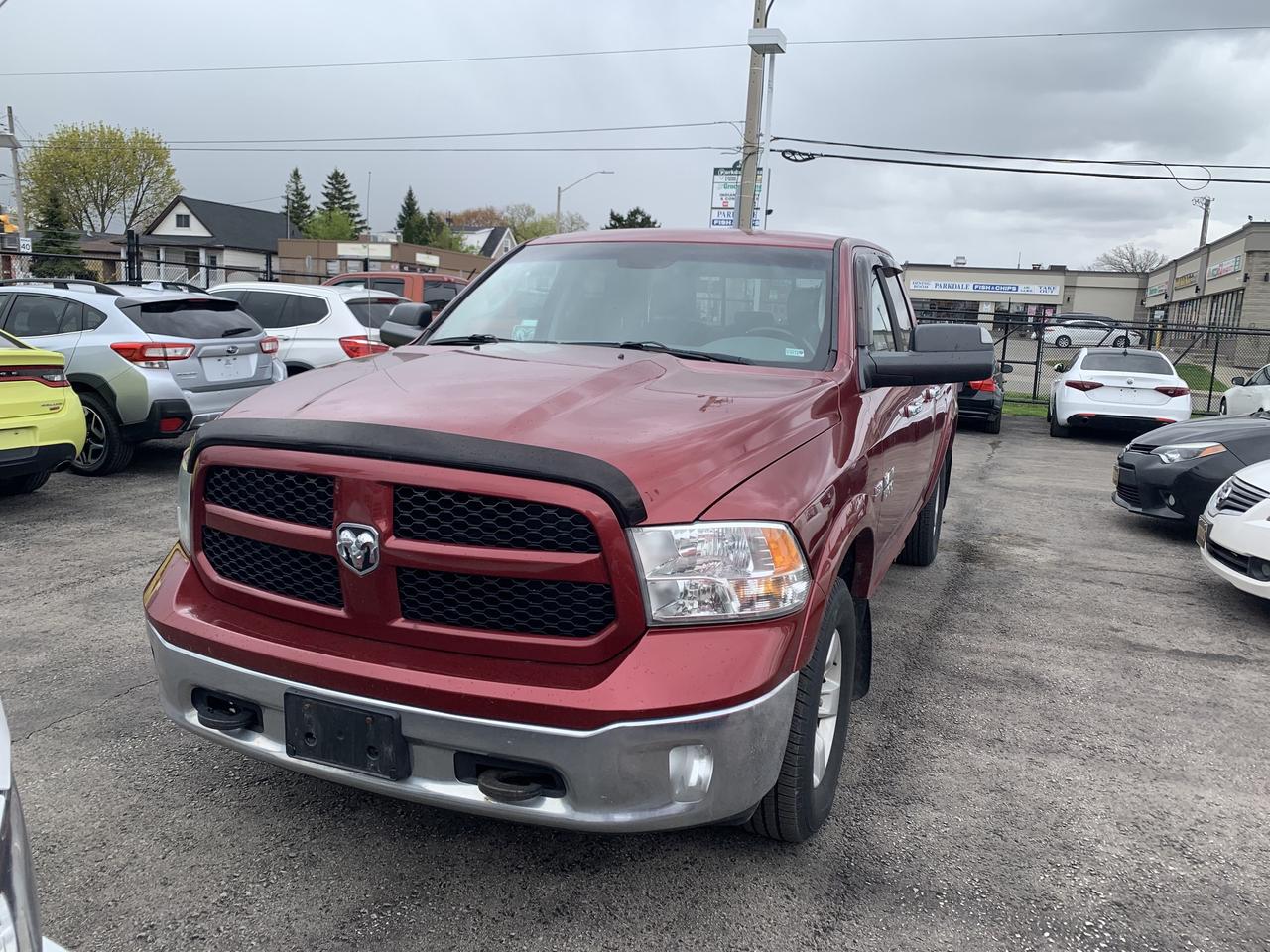 2014 RAM 1500 4WD Quad Cab 140.5  Outdoorsman Photo1