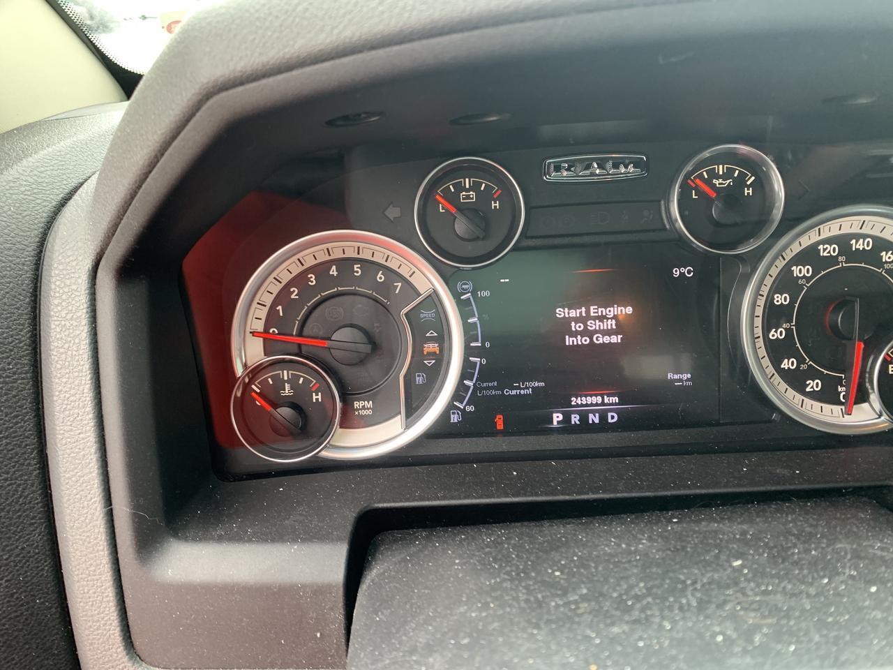 2014 RAM 1500 4WD Quad Cab 140.5  Outdoorsman Photo