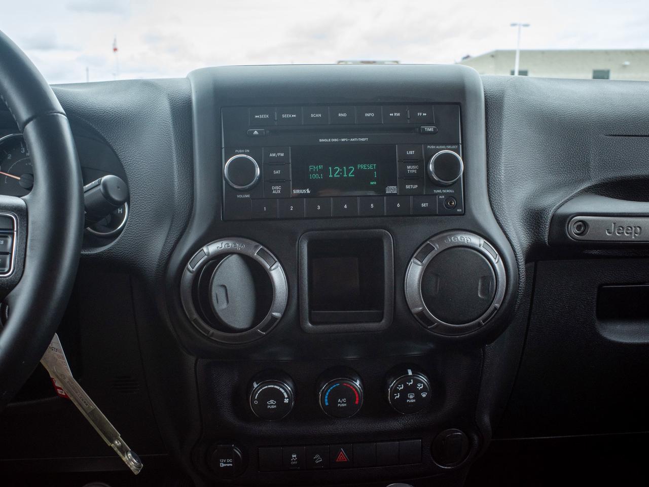 2015 Jeep Wrangler Sport - Convertible Soft Top   Rollover Protection Photo