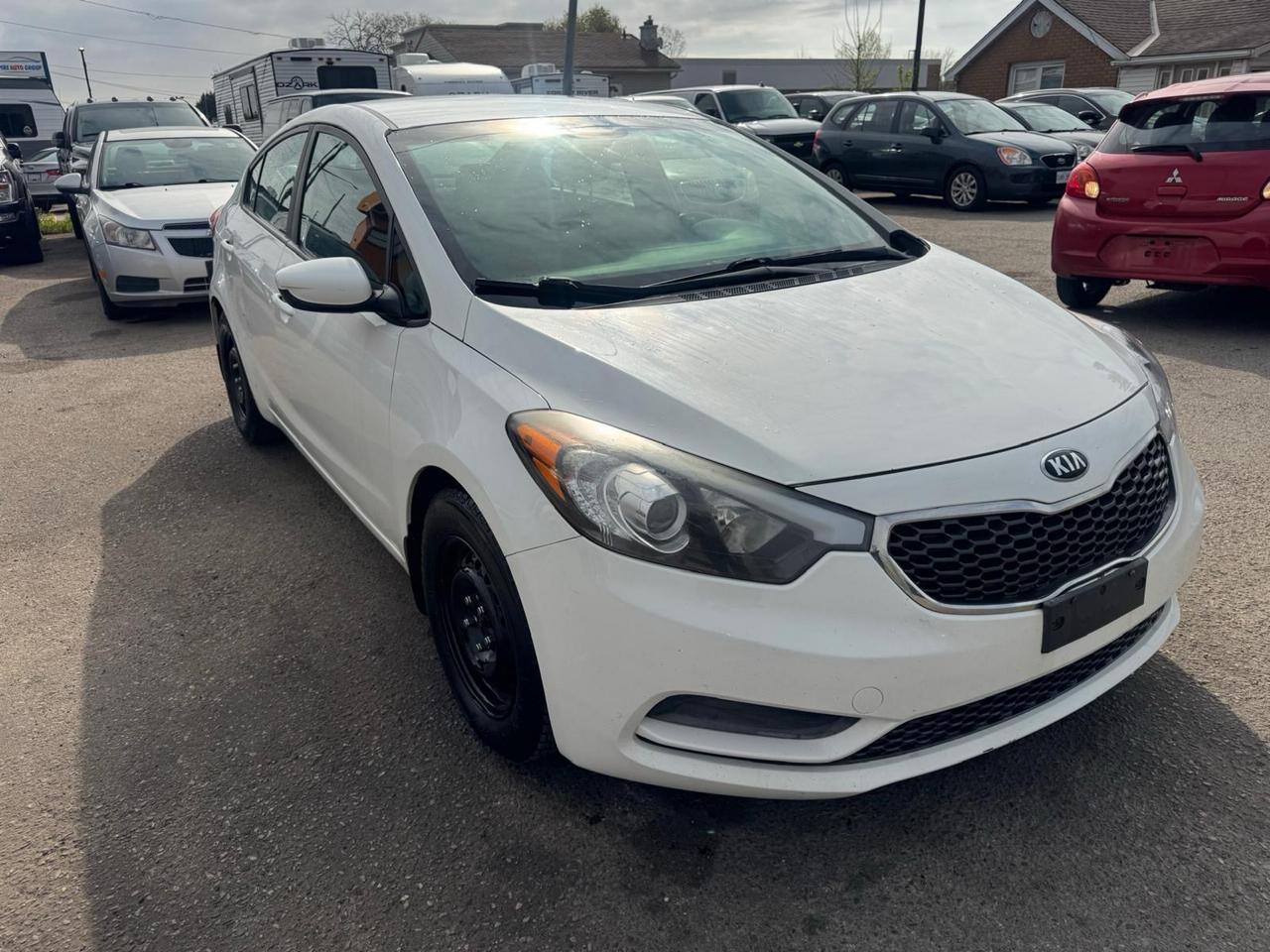 2016 Kia Forte LX, MANUAL, SEDAN, 4 CYL, GREAT ON FUEL, CERTIFIED Photo