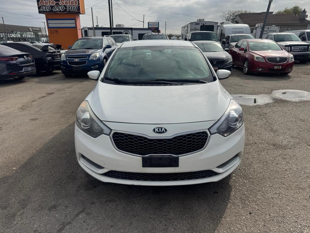 2016 Kia Forte LX, MANUAL, SEDAN, 4 CYL, GREAT ON FUEL, CERTIFIED Photo