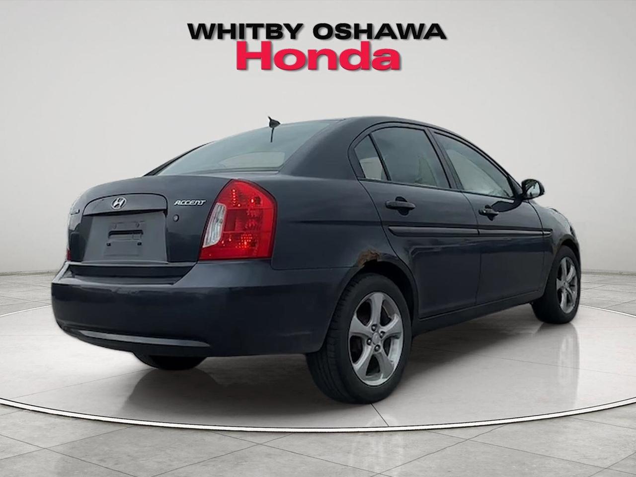 2010 Hyundai Accent 4dr Sdn Auto GL Photo