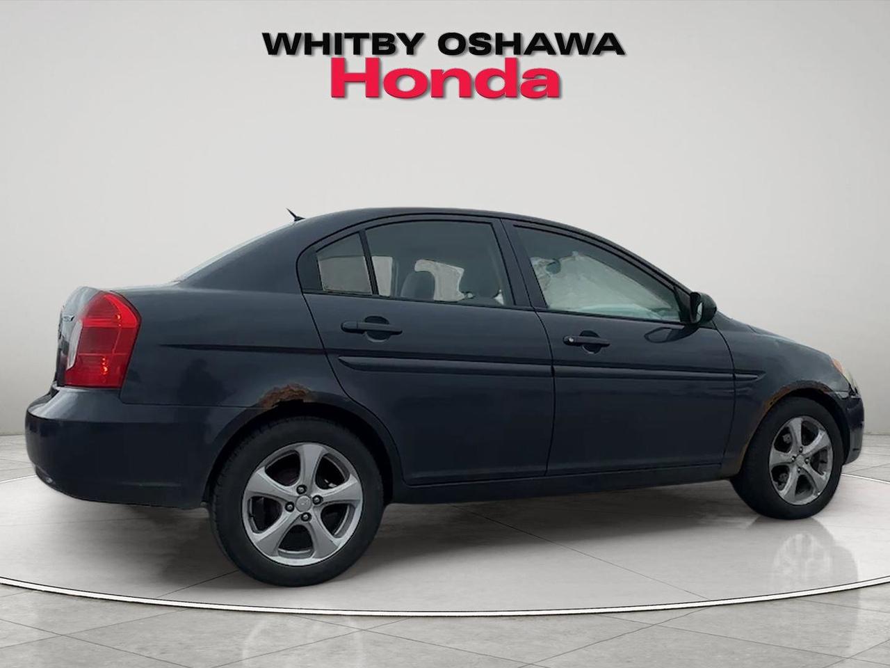 2010 Hyundai Accent 4dr Sdn Auto GL Photo