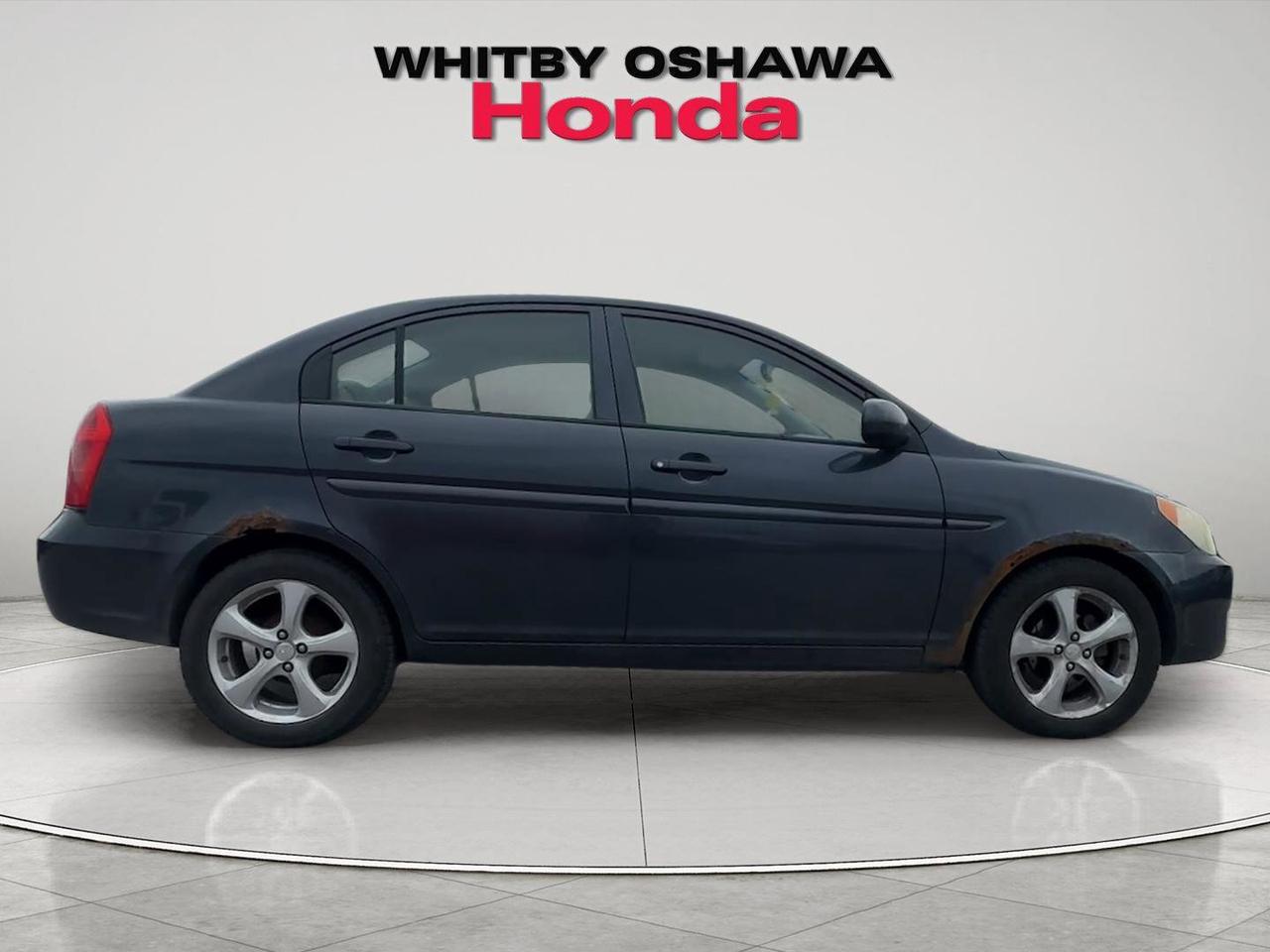 2010 Hyundai Accent 4dr Sdn Auto GL Photo