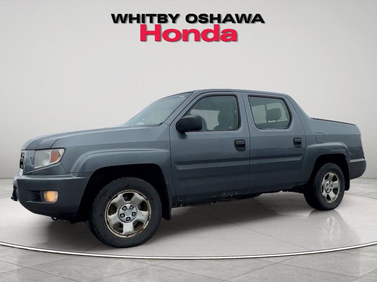 2010 Honda Ridgeline 4WD Crew Cab DX Photo