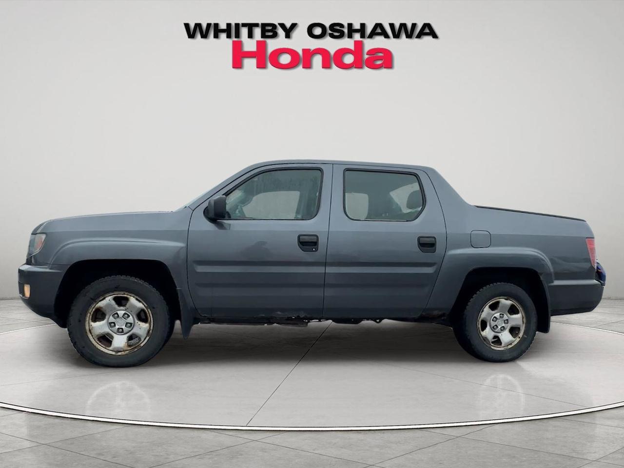 2010 Honda Ridgeline 4WD Crew Cab DX Photo