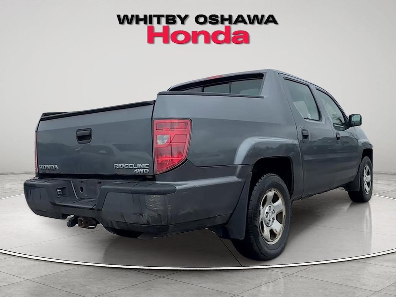 2010 Honda Ridgeline 4WD Crew Cab DX Photo