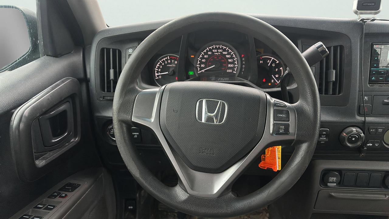 2010 Honda Ridgeline 4WD Crew Cab DX Photo