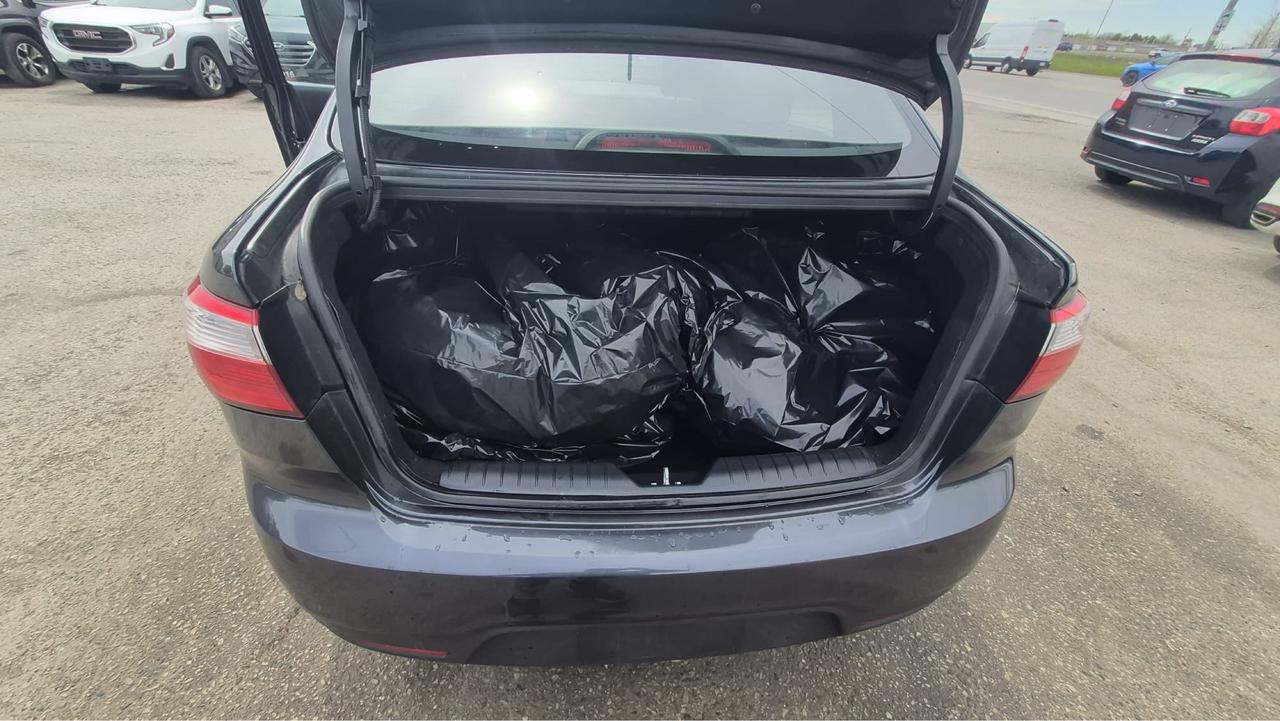 2014 Kia Rio LX+, AUTO, SEDAN, 4 CYL, GREAT ON FUEL, CERTIFIED Photo