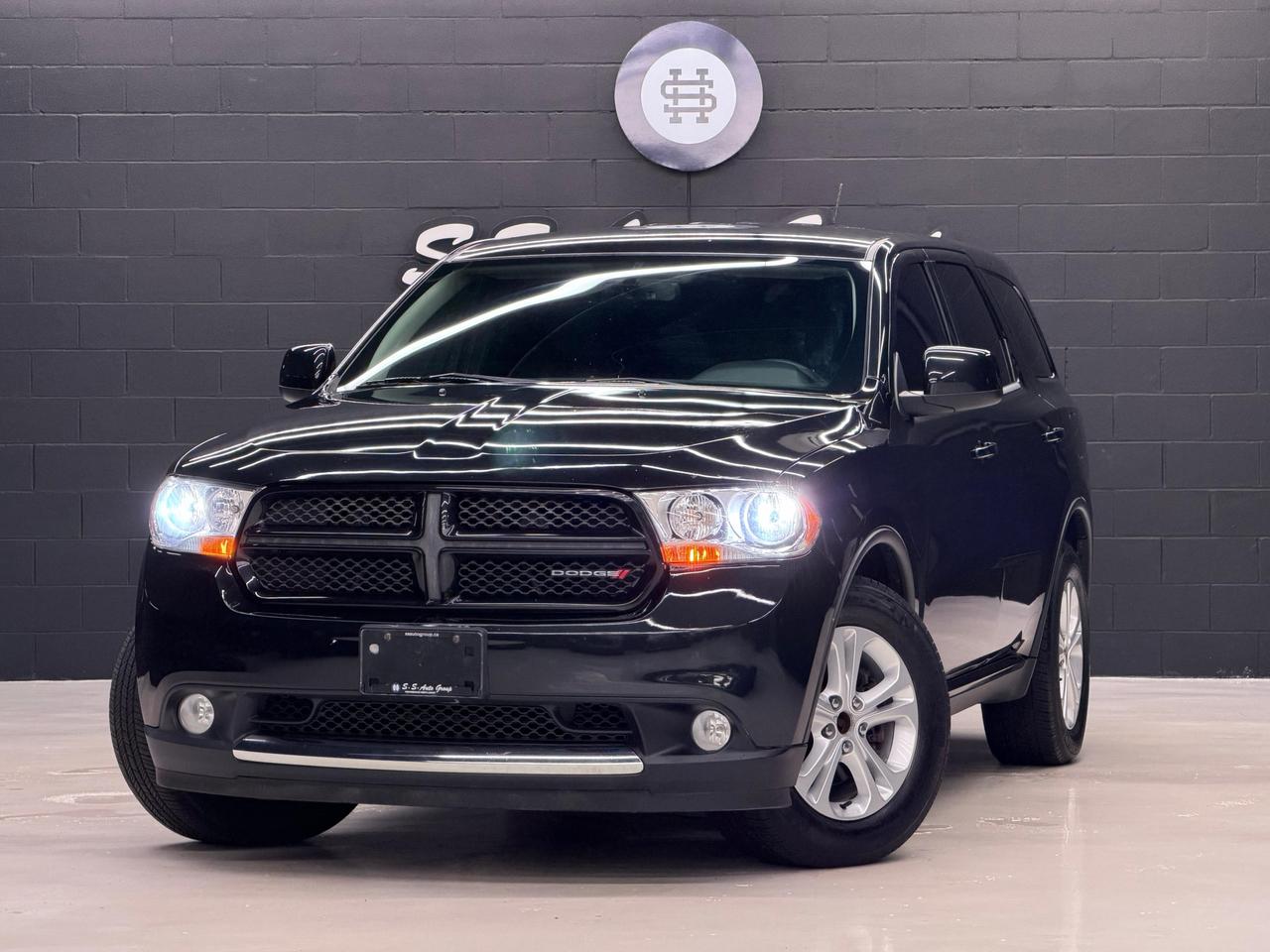 <p class=MsoNormal><span style=font-size: 9pt; line-height: 107%; color: rgb(0, 0, 0);>EXTENDED WARRANTY PACKAGES AVAILABLE UPTO 4 YEARS UNLIMITED KMS. VEHICLE WITH FULL SERVICE HISTORY - CARFAX REPORT IS AVAILABLE UPON REQUEST.</span></p><p class=MsoNormal style=mso-margin-top-alt: auto; mso-margin-bottom-alt: auto; line-height: normal;><span style=font-size: 9pt; color: rgb(0, 0, 0);>&nbsp;</span></p><p class=MsoNormal style=mso-margin-top-alt: auto; mso-margin-bottom-alt: auto; line-height: normal;><span style=font-size: 9pt; color: rgb(0, 0, 0); background-image: initial; background-position: initial; background-size: initial; background-repeat: initial; background-attachment: initial; background-origin: initial; background-clip: initial;>BEAUTIFUL 2013 DODGE DURANGO SXT HAS LANDED.&nbsp;&nbsp;3.6L V6 PRODUCING OVER 290HP AND 295LB/FT OF TORQUE.&nbsp;&nbsp;BLACK EXTERIOR ON BLACK INTERIOR. LOADED WITH BACK UP CAMERA, UPGRADED INFOTAINMENT SYSTEM, THIRD ROW SEATING, PREMIUM 18 INCH ALLOY WHEELS, AUTO HEADLIGHTS, CRUISE CONTROL AND MUCH MORE.&nbsp;&nbsp;</span></p><p class=MsoNormal><span style=font-size: 9pt; line-height: 107%; color: rgb(0, 0, 0);>&nbsp;</span></p><p class=MsoNormal><span style=color: rgb(0, 0, 0);><strong><span style=font-size: 9pt; line-height: 107%;>CERTIFICATION AVAILABLE FOR AN ADDITIONAL $999 &ndash;&nbsp;</span></strong><span style=font-size: 9pt; line-height: 107%;>IF NOT CERTIFIED AS PER OMVIC REGULATIONS THE VEHICLE IS DEEMED NOT DRIVABLE AND UNCERTIFIED.&nbsp;&nbsp;THIS FEE WILL ENSURE VEHICLE IS CERTIFIED AND ROAD WORTHY CONDITION. </span></span></p><p class=MsoNormal><span style=font-size: 9pt; line-height: 107%; color: rgb(0, 0, 0);>&nbsp;</span></p><p class=MsoNormal><span style=font-size: 9pt; line-height: 107%; color: rgb(0, 0, 0);>OUR VEHICLES ARE PRICED TO SELL.&nbsp; DRIVE THIS HOME TODAY!&nbsp;&nbsp;CONTACT US FOR MORE DETAILS.</span></p><p class=MsoNormal><span style=font-size: 9pt; line-height: 107%; color: rgb(0, 0, 0);>&nbsp;</span></p><p class=MsoNormal><span style=font-size: 9pt; line-height: 107%; color: rgb(0, 0, 0);>S S AUTO GROUP INC.</span></p><p class=MsoNormal><span style=font-size: 9pt; line-height: 107%; color: rgb(0, 0, 0);>460 WOODY ROAD</span></p><p class=MsoNormal><span style=font-size: 9pt; line-height: 107%; color: rgb(0, 0, 0);>OAKVILLE, ONTARIO L6K 3T6</span></p><p class=MsoNormal><span style=font-size: 9pt; line-height: 107%; color: rgb(0, 0, 0);>&nbsp;</span></p><p class=MsoNormal><span style=font-size: 9pt; line-height: 107%; color: rgb(0, 0, 0);>TEXT OR CALL:</span></p><p class=MsoNormal><span style=font-size: 9pt; line-height: 107%; color: rgb(0, 0, 0);>(6 4 7) - 8 8 6 - 8 1 8 2&nbsp; OR&nbsp; (6 4 7) - 5 2 3 - 0 0 6 9</span></p><p class=MsoNormal><span style=font-size: 9pt; line-height: 107%; color: rgb(0, 0, 0);>INSTAGRAM: @SSAUTOGROUP_</span></p>
