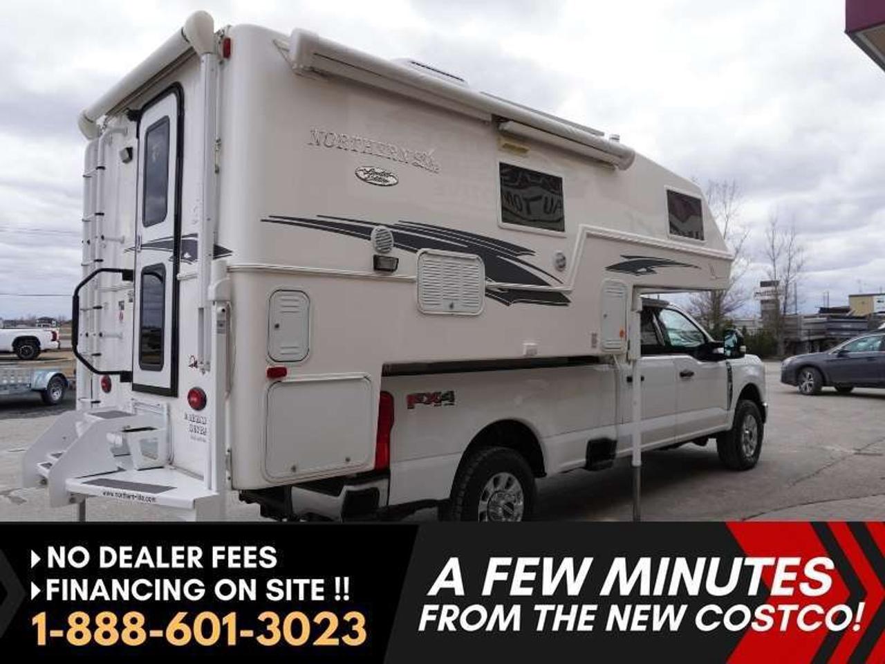LIKE NEW INSIDE AND OUT. Premium Canadian Made 2024 Northern Lite 10-2 EX LE Dry 4-season truck camper.  Go where no one else has, the world is at your fingertips. Known for its solid two-piece fiberglass clamshell construction, this truck camper is lightweight, strong, and designed to handle all weather, and any terrain one wants to explorer. The EX LE package brings premium upgrades, including solar system, high-end finishes, and enhanced off-grid capability.  Inside, enjoy a spacious layout with a north-south queen bed, full kitchen, dinette seating, and a dry bath (separate shower), all designed with a bright, modern interior and quality craftsmanship throughout.

Save big on this hardly used unit, compared to a new camper pricing.  Built for serious adventurers who want comfort, style, and durability. The exterior fiberglass shell is in excellent condition, featuring a side awning, front entrance awning, exterior speakers, and even space for a portable generator! (for the extreme off grid camping) The interior is spacious and equipped with loads of premium cabinetry, premium upholstery, a two-tone leather U-shaped dinette, a TV! This is a turn-key camper ready for your next adventure!

Dont miss this opportunity to own a premium Canadian-built truck camper, ready for year-round adventures.

Features
- 4-Season Insulated Design
- Two-Piece Fiberglass Clamshell Construction
- EX LE Premium Package
- Side Awning
- Back Awning
- Queen Bed
- Dry Bath (Separate Shower & Toilet)
- Full Kitchen with Stove, Oven & Microwave
- Large Fridge & Freezer
- Dinette Seating (Convertible)
- Air Conditioning
- Furnace Heating System
- Hot Water System
- Premium Interior Cabinetry
- Skylights & Roof Vents
- Ample Interior & Exterior Storage
- Lightweight Truck Camper Design
- Designed for Long Box Trucks
- Off-Grid Ready Electrical System

**NOTE: Truck not included in price**
