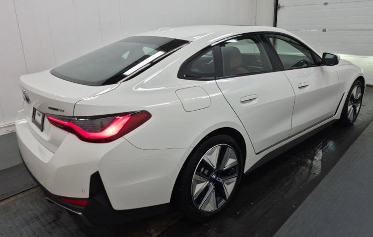 2025 BMW i4 eDrive40 Grand Coupe | Premium Enhanced PKG | Tacora Red Leather | Sunroof | Cross-Traffic Alert | Photo