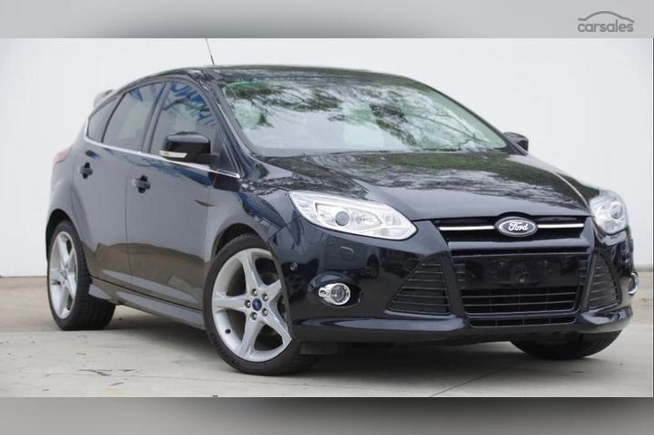 2014 Ford Focus TITANIUM/ LEATHER/ ROOF / LOW KM / FUEL SAVER /AC/ Photo