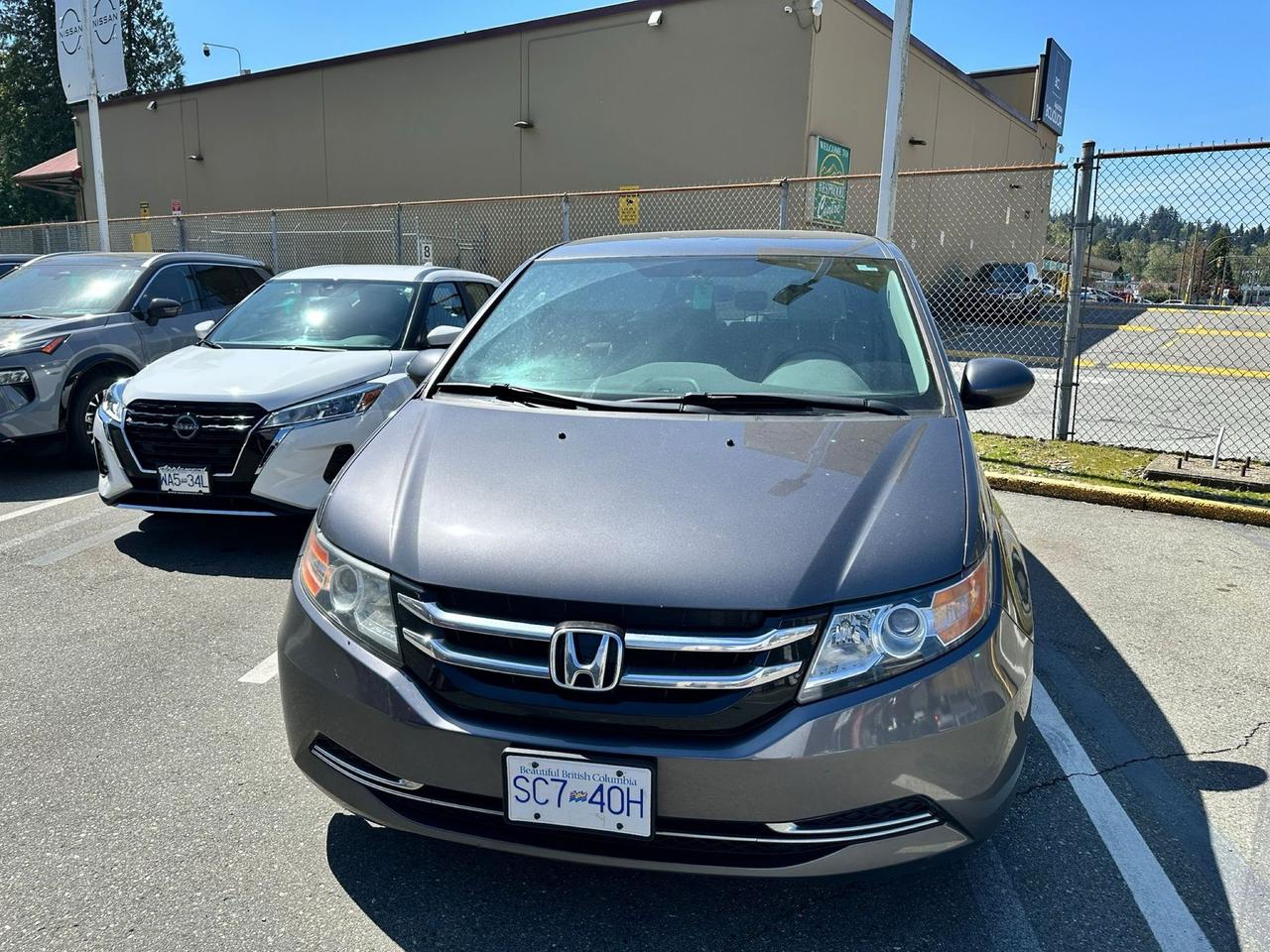<html>
<p>2014 Honda Odyssey EX  Leather  Power Doors  Local BC Van!</p>
<br>
<p>Exceptionally clean and very well cared for 2014 Honda Odyssey EX with only 195,000 kms. This local BC van is loaded with great family features including leather interior, dual power sliding doors, backup camera, alloy wheels, Bluetooth, power seat, cruise control, and much more!</p>
<br>
<p>Honda Odysseys are known for their reliability, comfort, and versatility. This van drives excellent and is perfect for family trips, daily commuting, or anyone needing extra space and seating.</p>
<br>
<p>Very clean inside and out and hard to find in this condition!</p>
<br>
<p>Sale Price: $12,880  </p>
<p>Plus $395 Documentation Fee and Taxes</p>
<br>
<p>Estimated Payments:  </p>
<p>$0 Down OAC Approx. $149 Bi-Weekly @ 7.99% over 60 months</p>
<br>
<p>All vehicles come with a FREE 90 Day Powertrain Warranty included! You can also use the value of the free warranty as a credit toward upgrading to a 12, 24, or 36 month Lubrico extended warranty. Ask us how to customize your warranty coverage to fit your budget!</p>
<br>
<p>Trades Welcome / Paid For Or Not</p>
<br>
<p>Milani Auto Sales has been serving Burnaby for over 30 years with a 4.9 Google rating!</p>
<br>
<p>Please check out our website for additional information:  </p>
<p><a href=www.milani.biz>www.milani.biz</a></p>
</html>