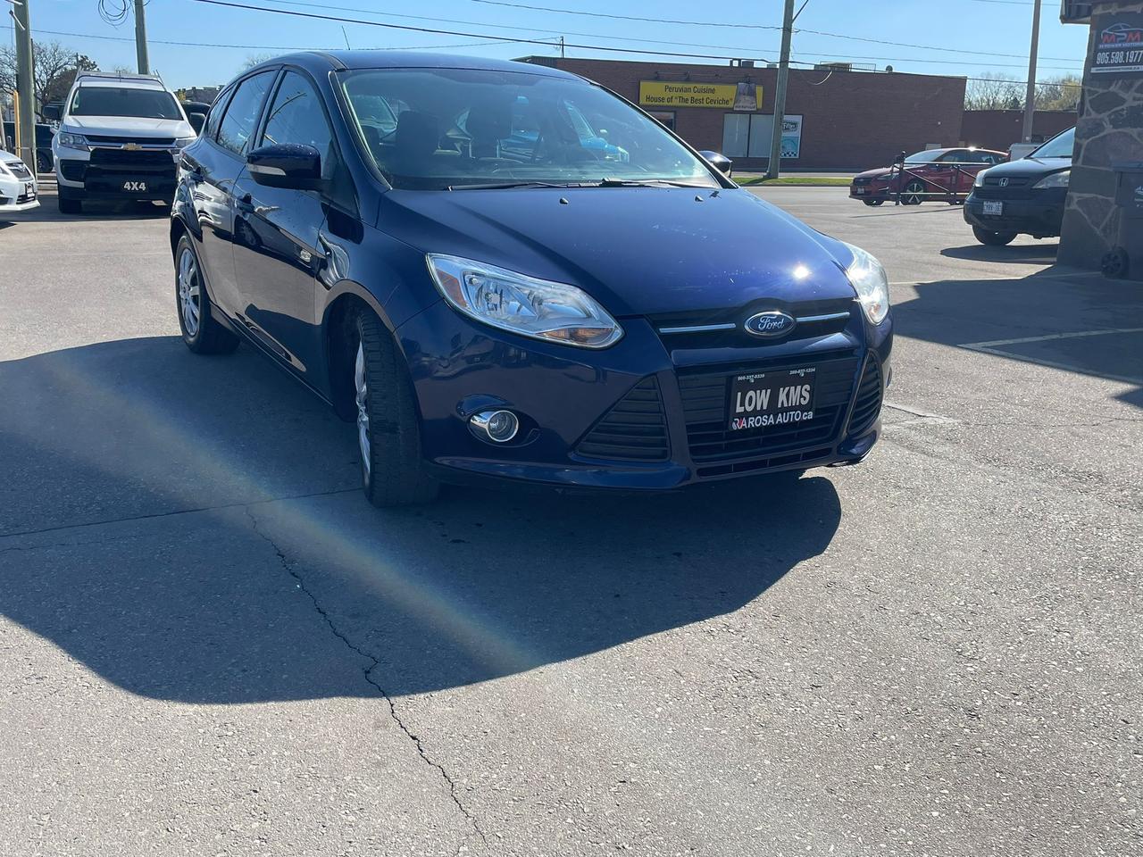 2012 Ford Focus AUTO 5DR HATCHBACK LOW KM !! SAFETY CERTIFIED!! Photo