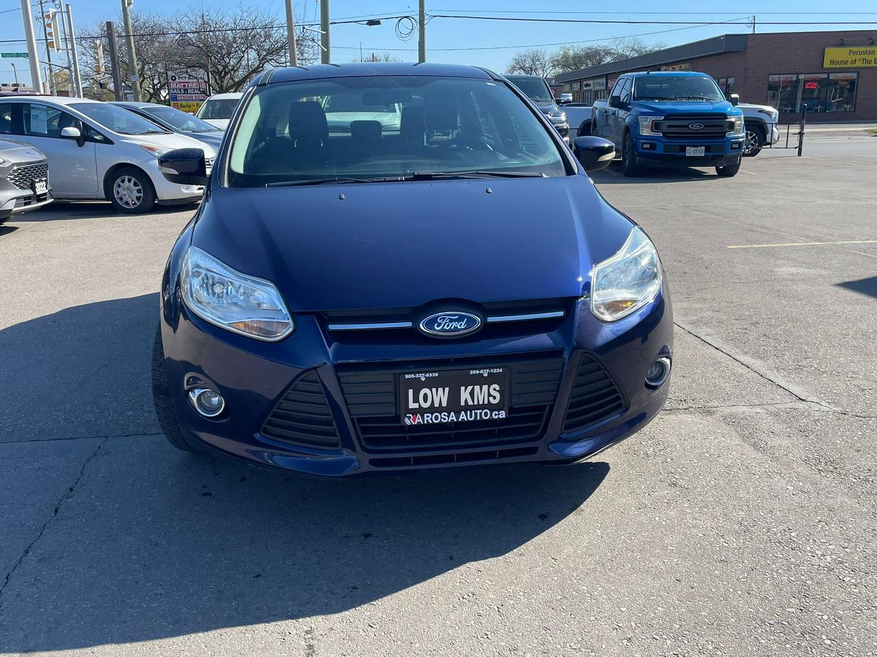 2012 Ford Focus AUTO 5DR HATCHBACK LOW KM !! SAFETY CERTIFIED!! Photo