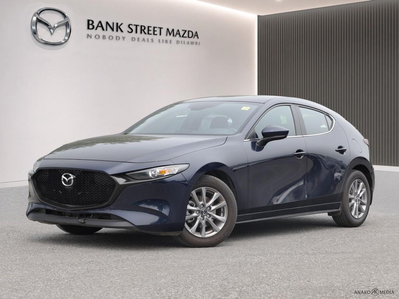 Introducing the stunning 2024 Mazda Mazda3 Sport in the GX Auto FWD trim. This elegant sedan, designed with a sleek forward-thinking drivetrain, ensures smooth and efficient handling suitable for any journey. The exteriors refined alloy wheels complement its sophisticated body type, making it a head-turner on any road. Inside, youll find a meticulously crafted interior featuring heated seats and metal-look instrument panel trim that provides both comfort and style. With the convenience of air conditioning and power windows, each drive is a pleasure. The 2024 Mazda3 Sport excels in integrating modern technology with features like a user-friendly smart device integration, a vibrant entertainment system accessible through Bluetooth connectivity, and essential driver assistance tools, including a backup camera and lane assist. Keyless entry adds ease to your routine, while cruise control ensures effortless longer journeys. Ideal for professionals, tech enthusiasts, or small families seeking a reliable and stylish vehicle, the 2024 Mazda3 Sport is engineered to satisfy diverse driving needs. Contact our dealership today for more details and to experience this incredible vehicle first-hand.
