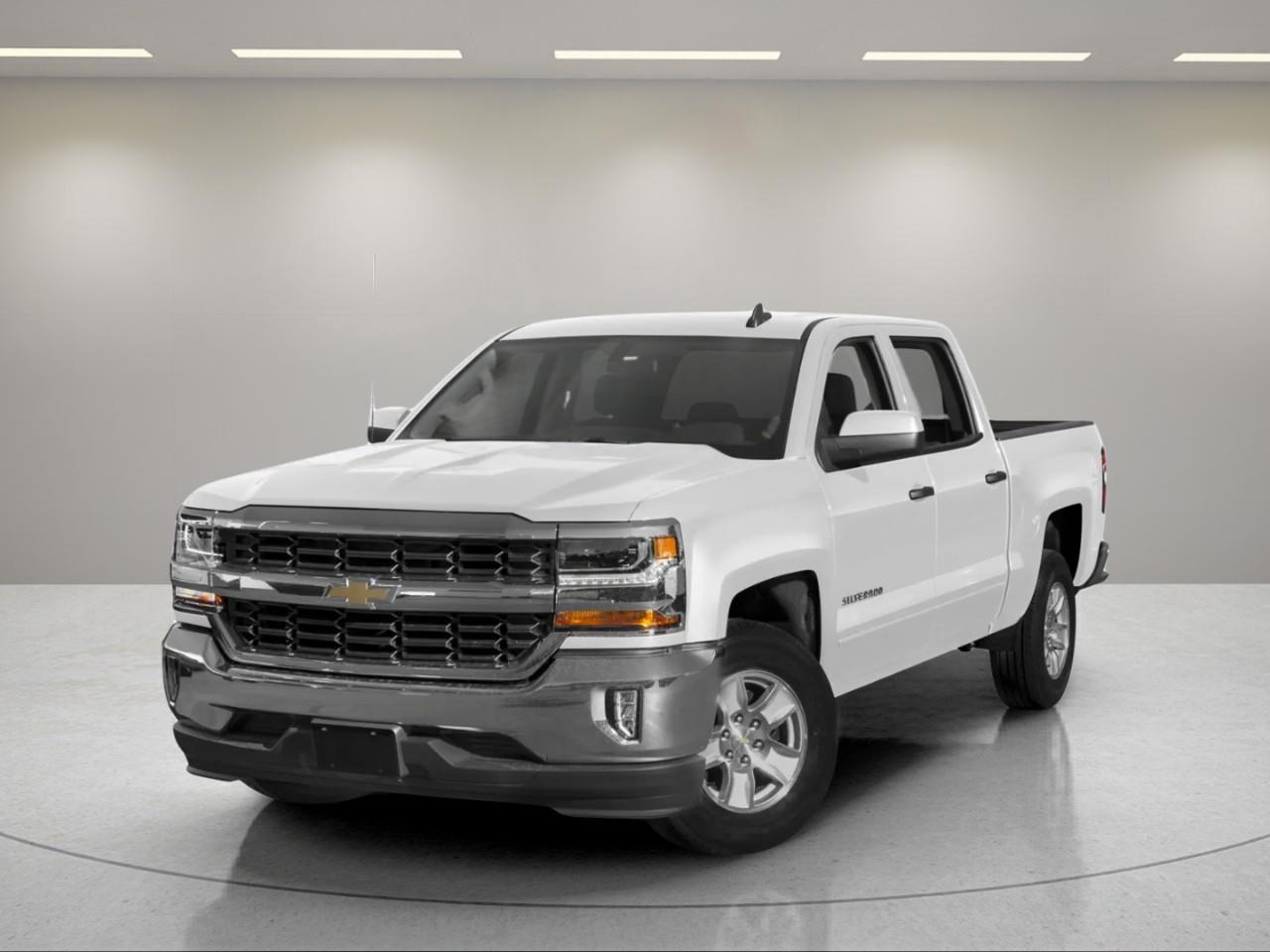<p>Experience rugged capability with the 2016 Chevrolet Silverado 1500 LT Crew Cab in stunning white, equipped with a robust 4×4 drivetrain and a smooth handling automatic transmission. This truck is engineered to tackle any terrain with confidence and grace.</p><p>The exterior of the Silverado 1500 boasts a commanding presence, complemented by its sturdy build and refined finish, offering a glimpse of its impressive power. Inside, you will find a well-crafted interior featuring a leather steering wheel and the comfort of keyless entry, enhancing your driving convenience.</p><p>Stay connected on the go with advanced technology such as Bluetooth connectivity, a satellite radio system, and smart device integration. The vehicle is designed with your safety in mind, offering features like heated mirrors for optimal visibility in all conditions. With a powerful 5.3L EcoTec3 V8 engine under the hood, delivering a formidable 355 horsepower and the adaptability of Active Fuel Management and Direct Injection technology, you can expect a performance that seamlessly blends power with efficiency.</p><p>This vehicle is perfect for adventurers, work professionals, or families needing a reliable companion for both daily drives and weekend getaways. Visit our dealership today to learn more about the 2016 Chevrolet Silverado 1500 LT and take it for a test drive. Our team is ready to assist you in making this exceptional truck yours.</p>