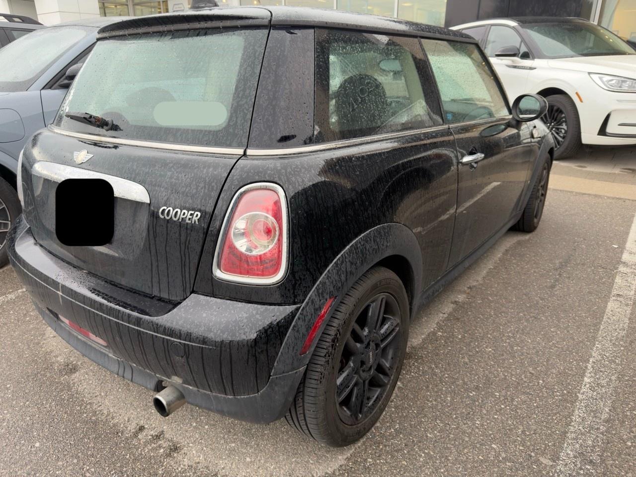2013 MINI Cooper Cooper MIDNIGHT BLACK | CARBON BLACK CHECKERED CLOTH SEAT TRIM | 6-SPEED MANUAL | BAKER STREET EDITION | BLACK TOP & MIRROR CAPS | 16 X 6.5 BLACK 6-STAR TWIN-SPOKE ALLOY WHLS Photo