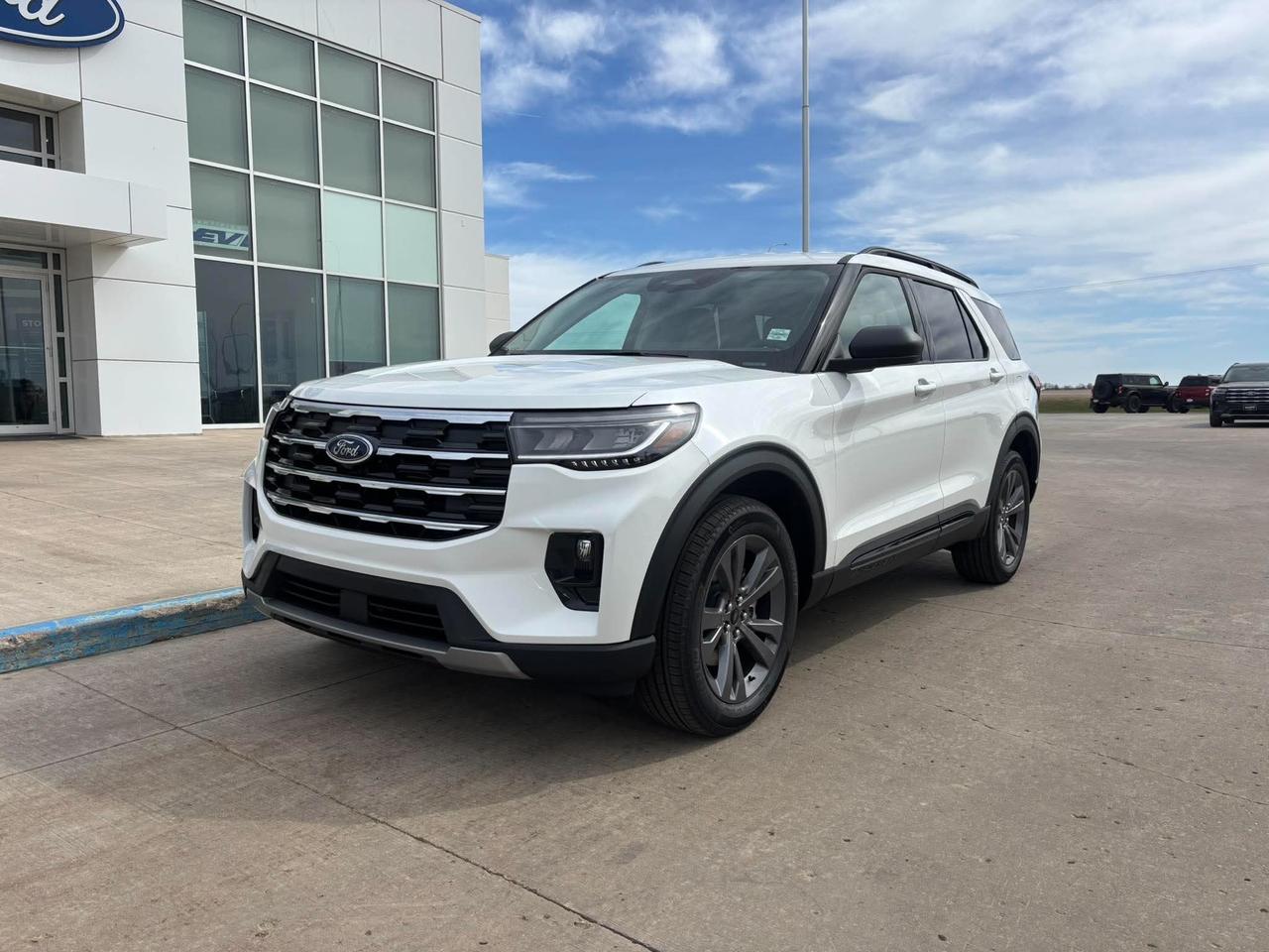 <p>Embark on your next adventure with the brand-new 2026 Ford Explorer Active, now available at Webbs 1441. This sophisticated SUV is engineered to impress, blending rugged capability with refined comfort for an unparalleled driving experience. Whether youre navigating city streets or venturing off the beaten path, the Explorer Active is your ultimate companion, offering a spacious interior, advanced technology, and the confidence of 4-wheel drive. Its striking Star White Metallic Tri-Coat finish, paired with sleek 20-inch Carbonized Grey-painted aluminum wheels, ensures youll turn heads wherever you go.</p><p>&nbsp;</p><p>Step inside the meticulously crafted cabin and discover a world of premium comfort. The Ultra Dark Space Grey interior creates an inviting atmosphere, while the Heated ActiveX Seating Material Captains Chairs provide exceptional support for both front and second-row passengers. Designed for the Canadian climate, this Explorer comes equipped with an engine block heater, ensuring reliable starts even on the coldest mornings. Plus, with the convenience of the SecuriCode Keyless Entry Keypad, accessing your vehicle has never been easier.</p><p>&nbsp;</p><p>Here are five features that make this 2026 Ford Explorer Active truly stand out:</p><p><br><br></p><ul><li><strong>2.3L EcoBoost I-4 Engine:</strong> Experience exhilarating power and impressive fuel efficiency, delivering a dynamic driving performance thats ready for anything.</li></ul><p>&nbsp;</p><ul><li><strong>20-inch Carbonized Grey-Painted Aluminum Wheels:</strong> These striking wheels not only enhance the Explorers bold stance but also contribute to its sporty and modern aesthetic.</li></ul><p>&nbsp;</p><ul><li><strong>Heated ActiveX Seating Material Captains Chairs:</strong> Indulge in superior comfort with these premium heated seats, offering a luxurious and supportive experience for every journey.</li></ul><p>&nbsp;</p><ul><li><strong>Star White Metallic Tri-Coat Exterior Paint:</strong> This premium finish provides a deep, lustrous shine that elevates the Explorers already captivating design, making it a true showstopper.</li></ul><p>&nbsp;</p><ul><li><strong>SecuriCode Keyless Entry Keypad:</strong> Enjoy the ultimate convenience and security with this integrated keypad, allowing you to unlock your vehicle without fumbling for keys.</li></ul><p><br><br></p><p><strong><em>Powered by AutoIntelligence&trade;</em></strong></p><p>&nbsp;</p><p>Powered by AutoIntelligence&trade;</p><p>&nbsp;</p>