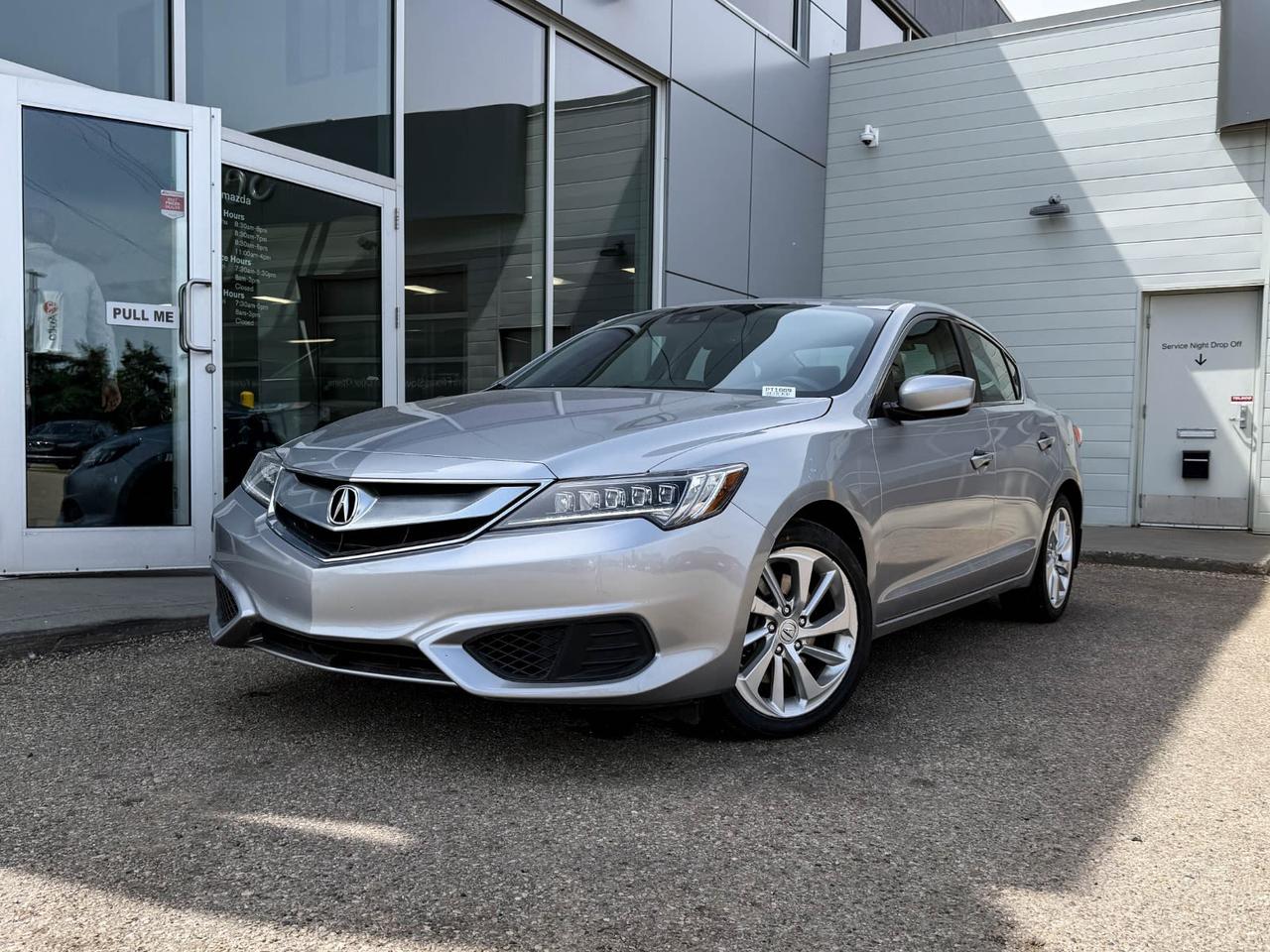 Discover the perfect blend of luxury, performance, and reliability with this pre-owned 2017 Acura ILX Premium Sedan in sleek Silver. Powered by a spirited 2.4L DOHC i-VTEC 4-cylinder engine paired with an 8-speed dual-clutch automatic transmission, it delivers smooth, responsive handling and efficient driving. Step inside to experience heated leather-trimmed seats, dual-zone automatic climate control, and a premium AM/FM/CD/XM audio system with integrated navigation for comfort and convenience on every journey. Safety features like adaptive cruise control, lane departure prevention, blind spot warning, and a rearview camera provide peace of mind. Finished with stylish 17 alloy wheels and LED headlights, this Acura ILX Premium is your sophisticated, fun-to-drive sedanready to elevate your daily drive. Contact us today to schedule your test drive!Go Mazda is an AMVIC licensed businessThis vehicle is showing a CarFax incident in the amount of $4,191.00