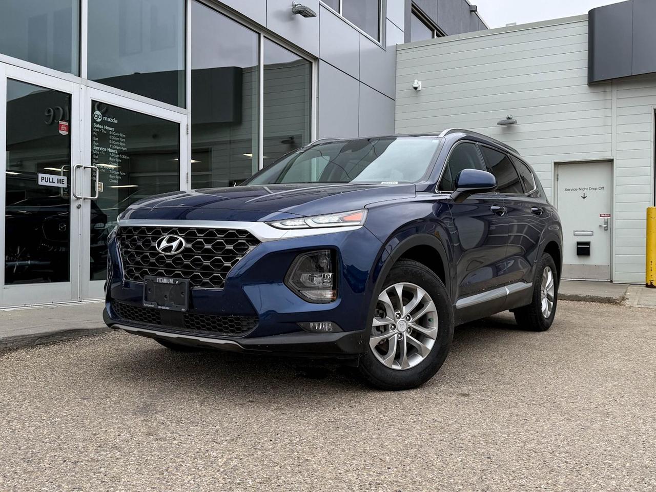 Discover the perfect blend of comfort, safety, and style with this pre-owned 2019 Hyundai Santa Fe Essential 2.4L AWD with Safety Package in striking blue and sleek black interior. Powered by a 2.4L GDI 16-valve 4-cylinder engine paired with an 8-speed automatic transmission, this SUV offers smooth performance and all-weather confidence with full-time AWD.Enjoy heated front bucket seats, modern tech including a 7-inch touchscreen, wireless audio streaming, and advanced safety features like lane departure prevention, forward collision mitigation, and pedestrian impact prevention for peace of mind on every drive.With spacious seating for five, versatile cargo options, and a reliable, fuel-efficient engine, this Hyundai Santa Fe is ready for your next adventure. Experience dependable quality and smart design  schedule your test drive today!Go Mazda is an AMVIC licensed businessThis vehicle has been registered in the province ofBritish Columbia