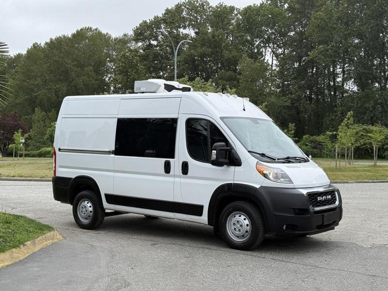 This 2020 Ram ProMaster High Roof cargo van is powered by a 3.6L Pentastar V6 paired with an automatic transmission and front-wheel drive, offering a practical commercial platform for temperature-controlled transport. Equipped with a 2021 Zanotti Z380S-F refrigeration unit and a dedicated freezer compartment, this van is well suited for cold-chain delivery, food service, floral transport, or specialty refrigerated logistics. It also features a shore power plug for stationary cooling operation.

Configured with a high roof and rear hinged doors with 260-degree opening, this ProMaster offers improved cargo access and flexible loading capability. Additional equipment includes ParkView rear back-up camera, hands-free communication with Bluetooth, Uconnect 3 with 5-inch touchscreen, air conditioning, power windows, power door locks, and power mirrors. Safety and stability features include 4-wheel ABS, heavy-duty suspension, Electronic Stability Control, Hill Start Assist, Electronic Roll Mitigation, Trailer Sway Control, and supplemental side curtain airbags. Rated at a GVWR of 4,036 kg (8,900 lb), this refrigerated cargo van offers a practical and capable setup for commercial use. This item is currently OFFSITE. You must register an appointment with our office to schedule an offsite viewing. Appointments must be made a minimum of one business day in advance (and as defined by the days that Repo.com is open for business) before your appointment can be scheduled and confirmed. We may, at our own discretion, instead opt to transport smaller items to Repo.coms main yard for viewing purposes.  $48,580.00 plus $375 processing fee, $48,955.00 total payment obligation before taxes.   Listing report, warranty, contract commitment cancellation fee, financing available on approved credit (some limitations and exceptions may apply). All above specifications and information is considered to be accurate but is not guaranteed and no opinion or advice is given as to whether this item should be purchased. We do not allow test drives due to theft, fraud, acts of vandalism and undetectable impaired driving. Instead we provide the following benefits: Complimentary Warranty (with options to extend), Limited Money Back Satisfaction Guarantee on Fully Completed Contracts, Contract Commitment Cancellation, and an Open-Ended Sell-Back Option. Ask seller for details or call 604-522-REPO(7376) to confirm listing availability.
