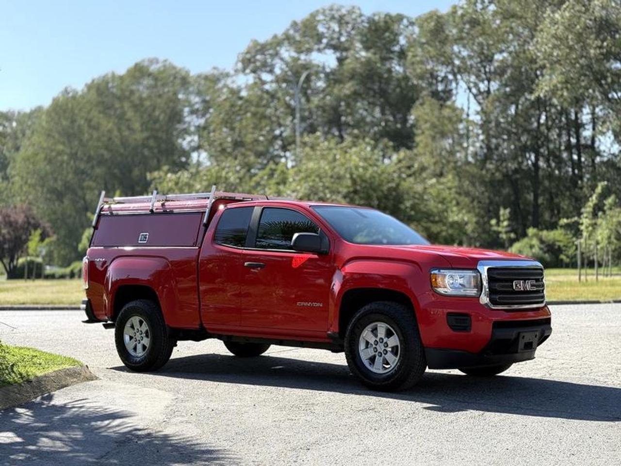 This 2018 GMC Canyon Work Truck Extended Cab 4WD is powered by a 3.6L V6 paired with an automatic transmission and equipped with four-wheel drive. Outfitted for utility, it features a canopy, Decked storage compartment system with roll-out storage, trailer hitch receiver, integrated trailer brake controller, and is tow ready for hauling duties. Additional features include backup camera, Bluetooth connectivity, AM/FM radio, and air conditioning. Finished in red with a gray cloth interior, this Canyon offers a practical midsize pickup setup well suited for work, storage organization, and everyday use. This item is currently OFFSITE. You must register an appointment with our office to schedule an offsite viewing. Appointments must be made a minimum of one business day in advance (and as defined by the days that Repo.com is open for business) before your appointment can be scheduled and confirmed. We may, at our own discretion, instead opt to transport smaller items to Repo.coms main yard for viewing purposes.  $16,820.00 plus $375 processing fee, $17,195.00 total payment obligation before taxes.   Listing report, warranty, contract commitment cancellation fee, financing available on approved credit (some limitations and exceptions may apply). All above specifications and information is considered to be accurate but is not guaranteed and no opinion or advice is given as to whether this item should be purchased. We do not allow test drives due to theft, fraud, acts of vandalism and undetectable impaired driving. Instead we provide the following benefits: Complimentary Warranty (with options to extend), Limited Money Back Satisfaction Guarantee on Fully Completed Contracts, Contract Commitment Cancellation, and an Open-Ended Sell-Back Option. Ask seller for details or call 604-522-REPO(7376) to confirm listing availability.